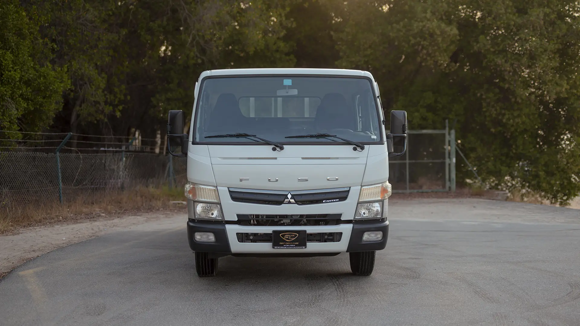Used 2024 Mitsubishi Canter Double Cabin Cargo Body in White – Front View for Sale at First Choice Cars Dubai Sharjah