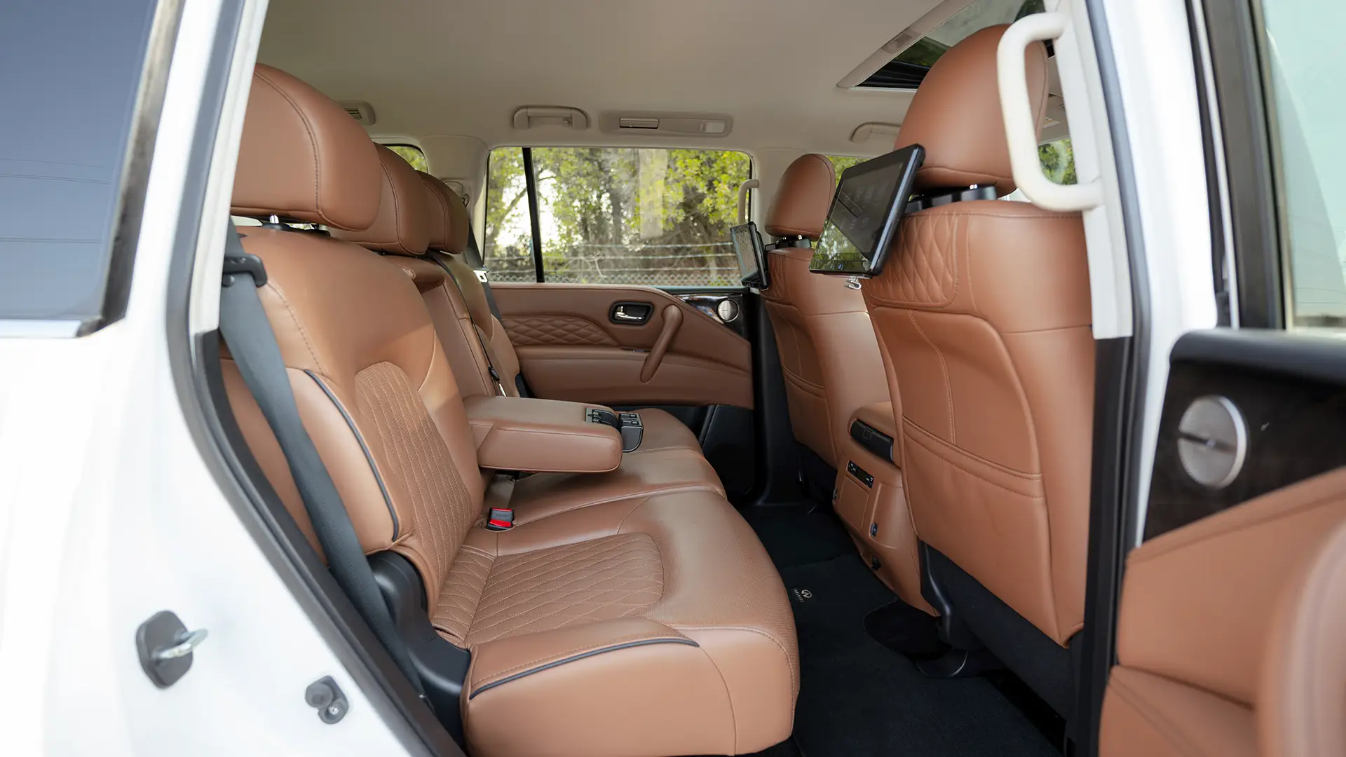 Used 2023 Infiniti QX80 Sensory in White – Rear Passenger Side Cabin View for Sale at First Choice Cars Dubai Sharjah