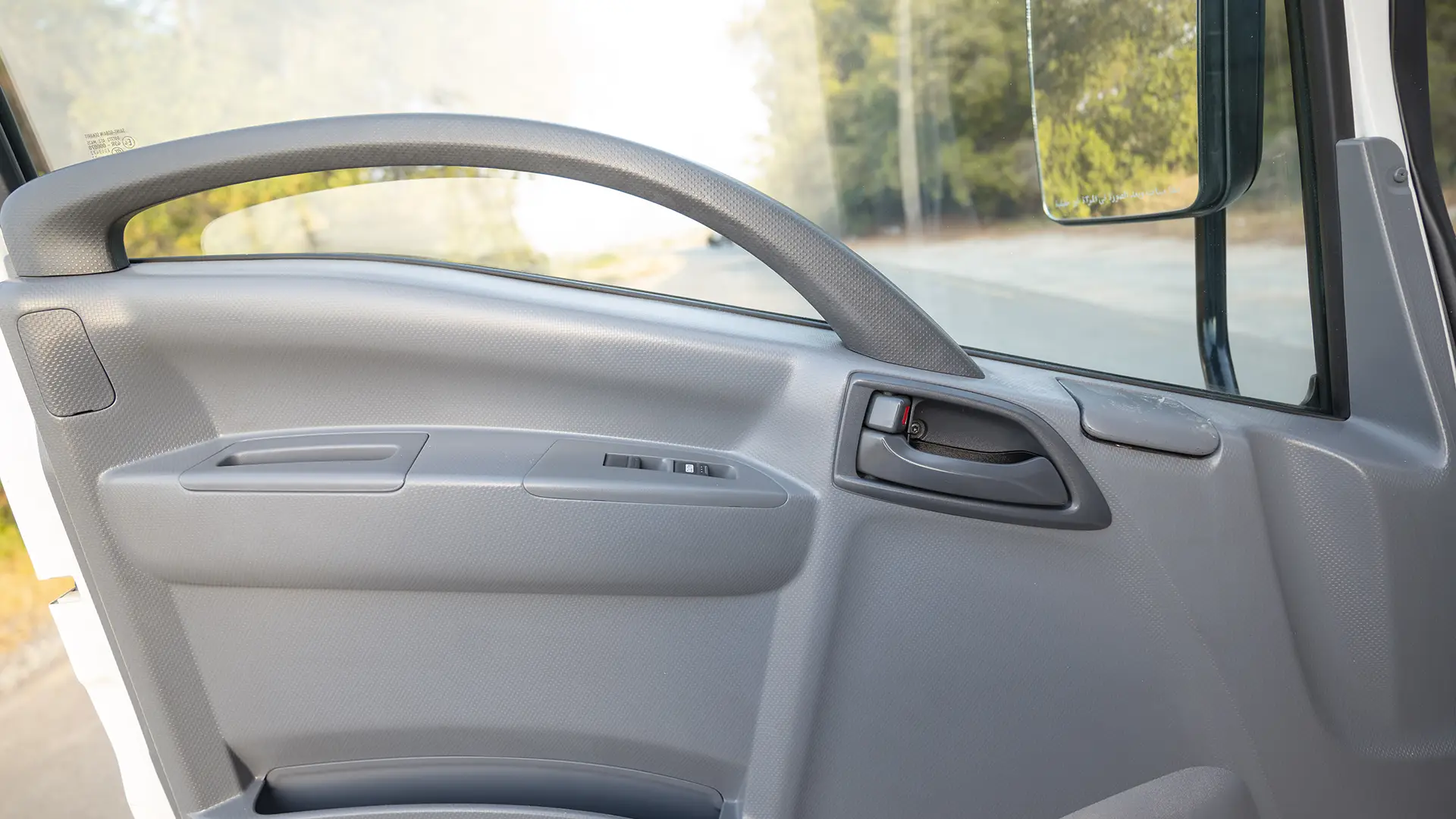 Used 2023 Isuzu Reward Chiller in White – Driver Door Panel Full View for Sale at First Choice Cars Dubai Sharjah