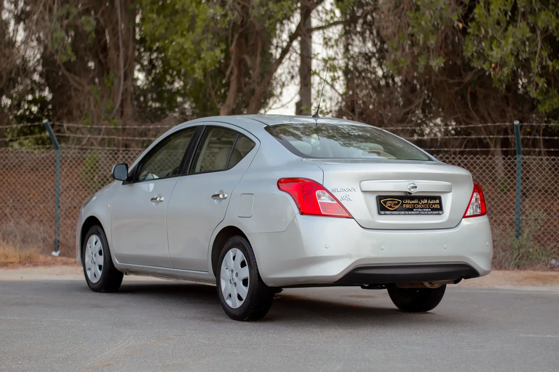Used 2023 Nissan Sunny SV in Silver – Left Back Diagonal (45°) View for Sale at First Choice Cars Dubai Sharjah