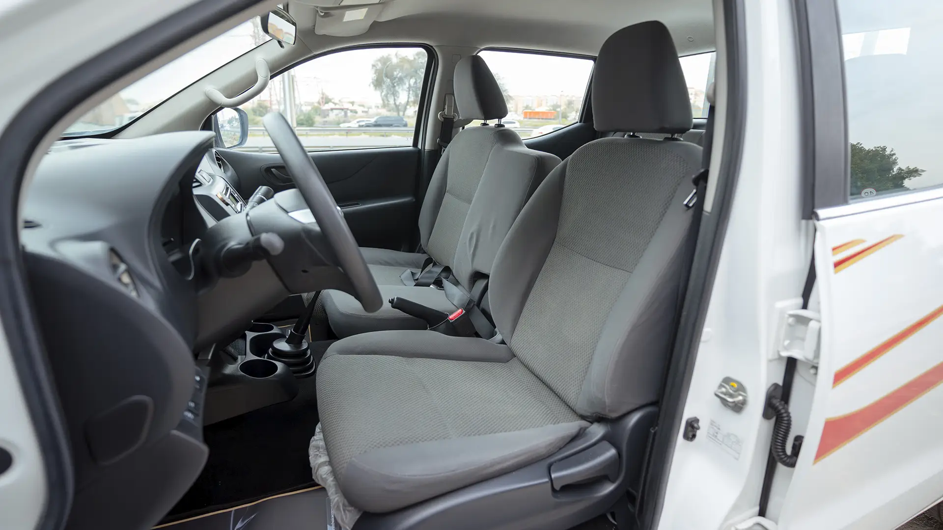 Used 2022 Nissan Navara SE in White – Front Driver Side Cabin View for Sale at First Choice Cars Dubai Sharjah