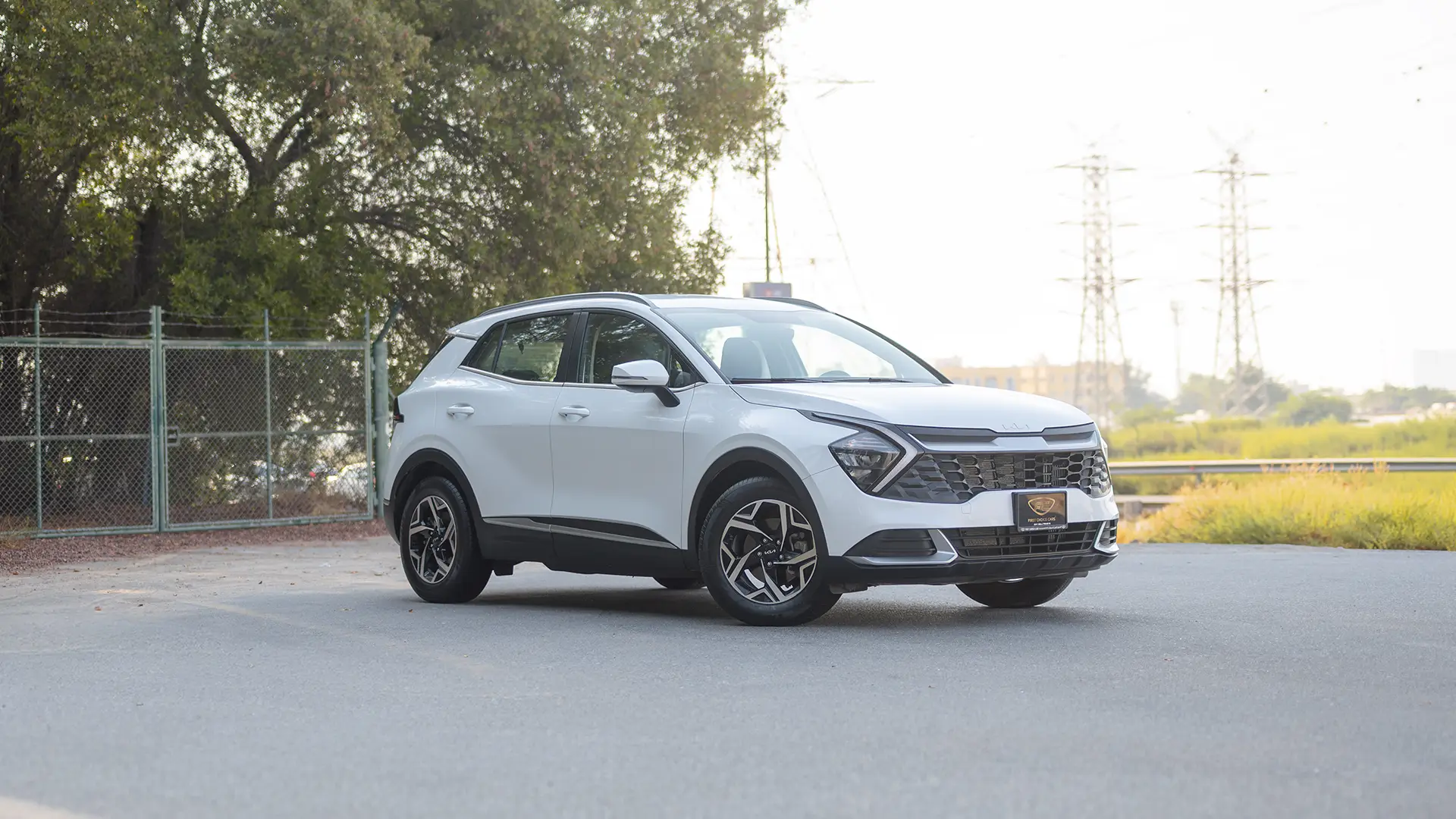 Used 2023 Kia Sportage EX in White – Right Front Diagonal (45°) View for Sale at First Choice Cars Dubai Sharjah
