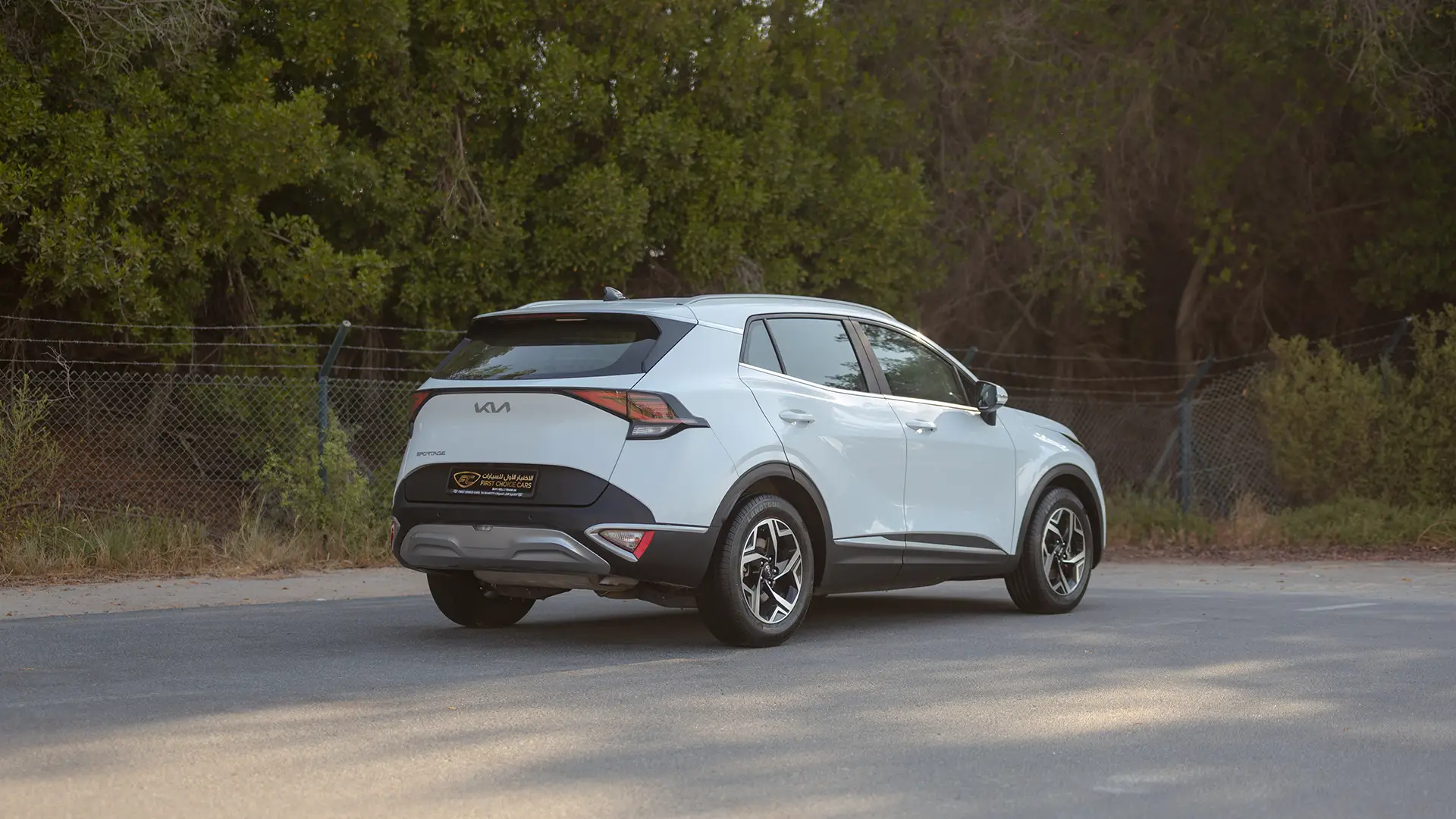 Used 2023 Kia Sportage EX in White – Right Back Diagonal (45°) View for Sale at First Choice Cars Dubai Sharjah