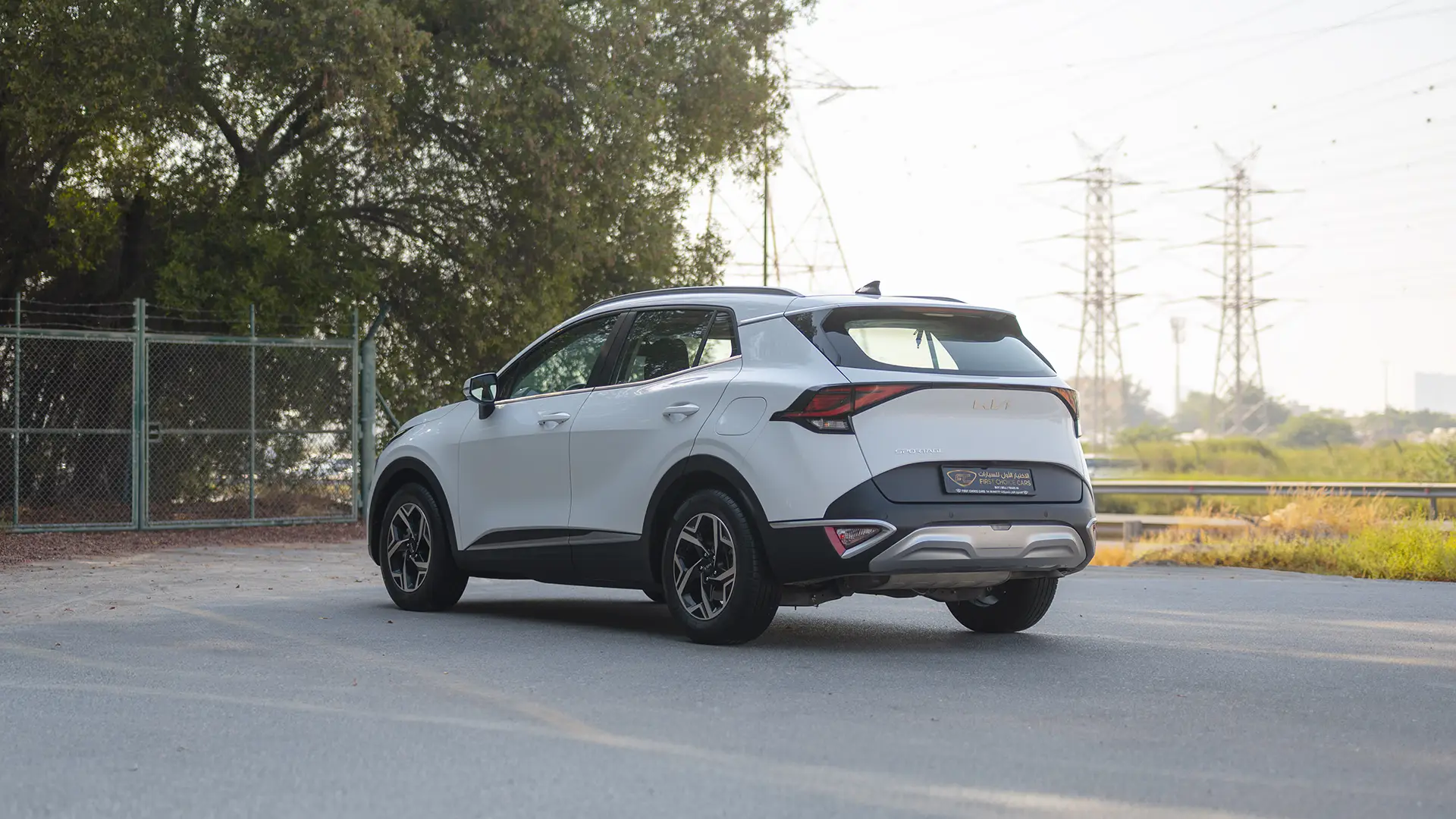 Used 2023 Kia Sportage EX in White – Left Back Diagonal (45°) View for Sale at First Choice Cars Dubai Sharjah