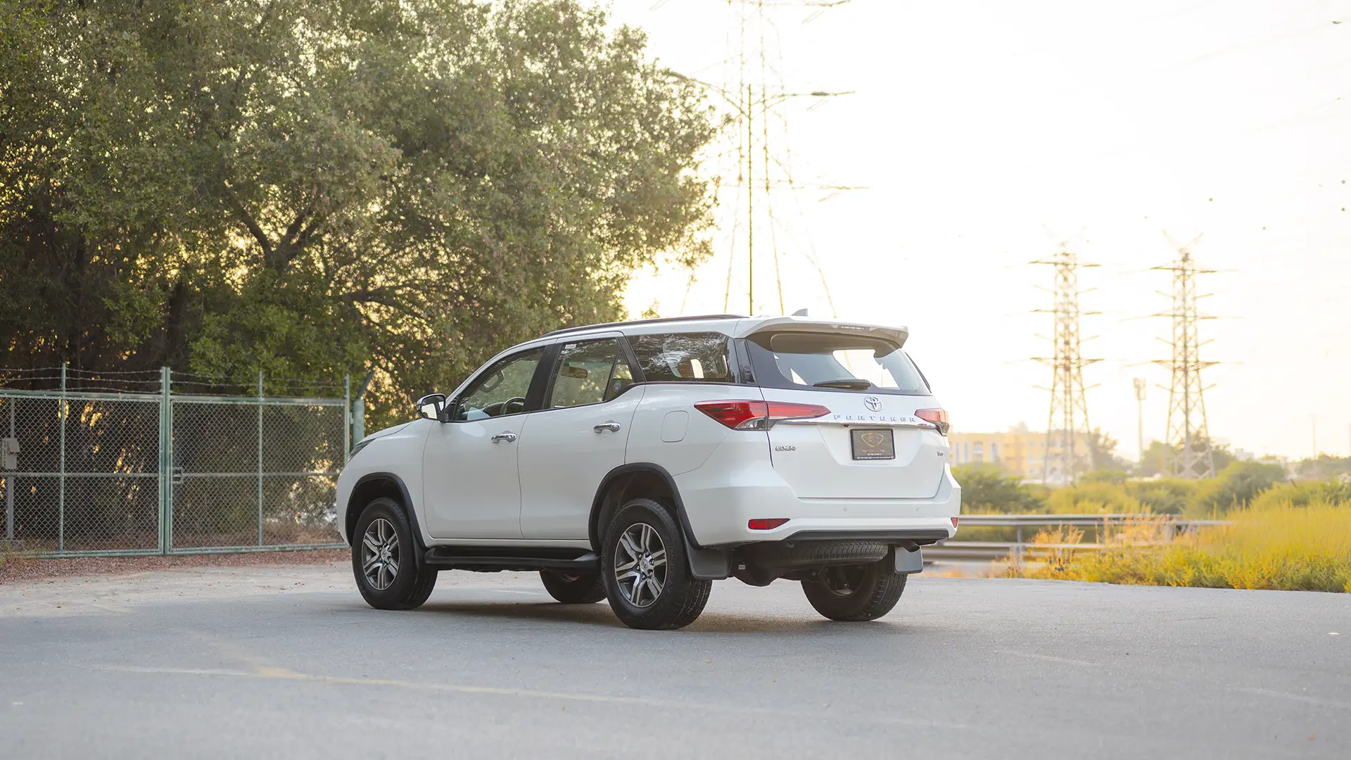 Used 2020 Toyota Fortuner GXR in White – Left Back Diagonal (45°) View for Sale at First Choice Cars Dubai Sharjah