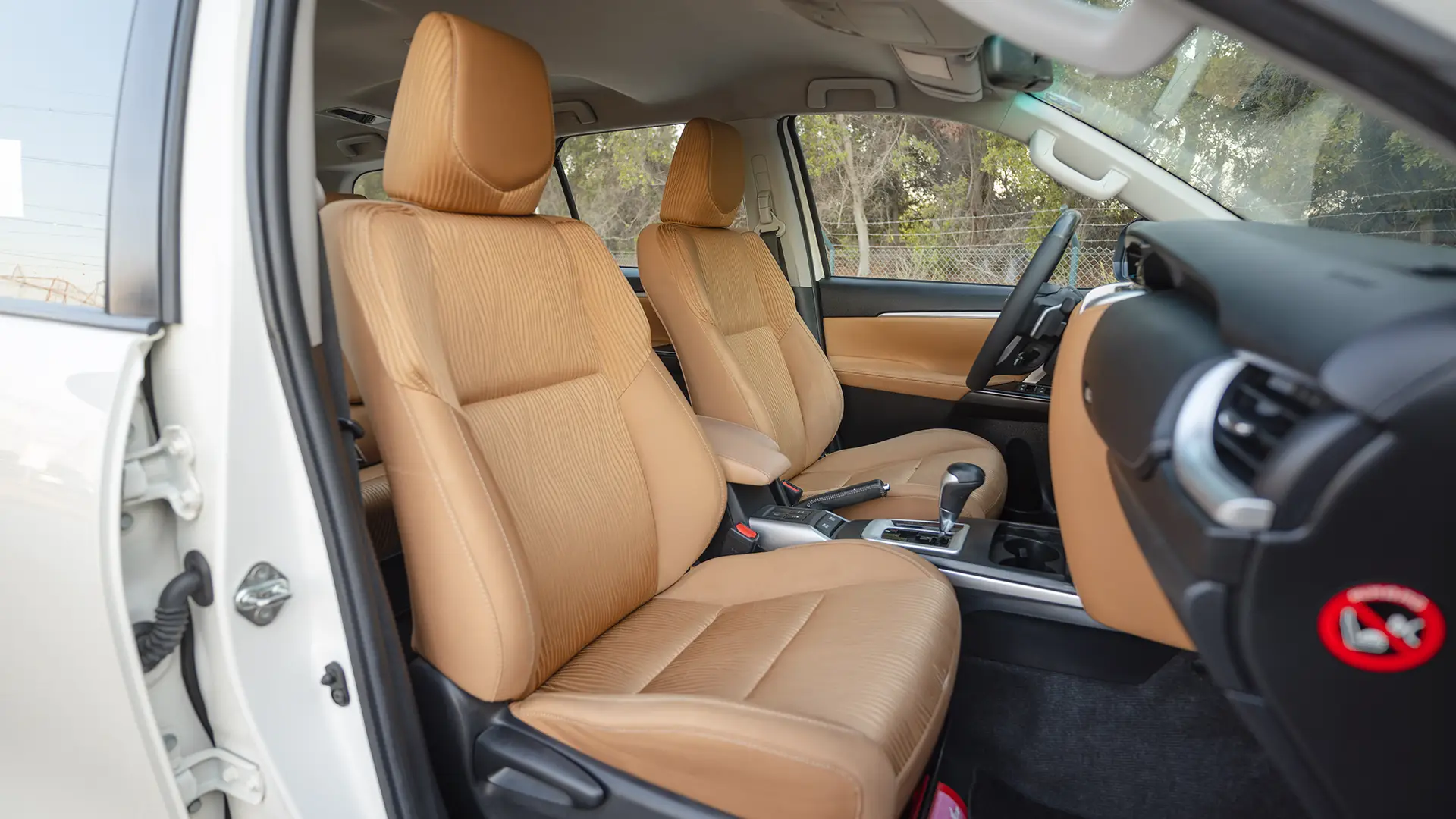 Used 2020 Toyota Fortuner GXR in White – Front Passenger Side Cabin View for Sale at First Choice Cars Dubai Sharjah