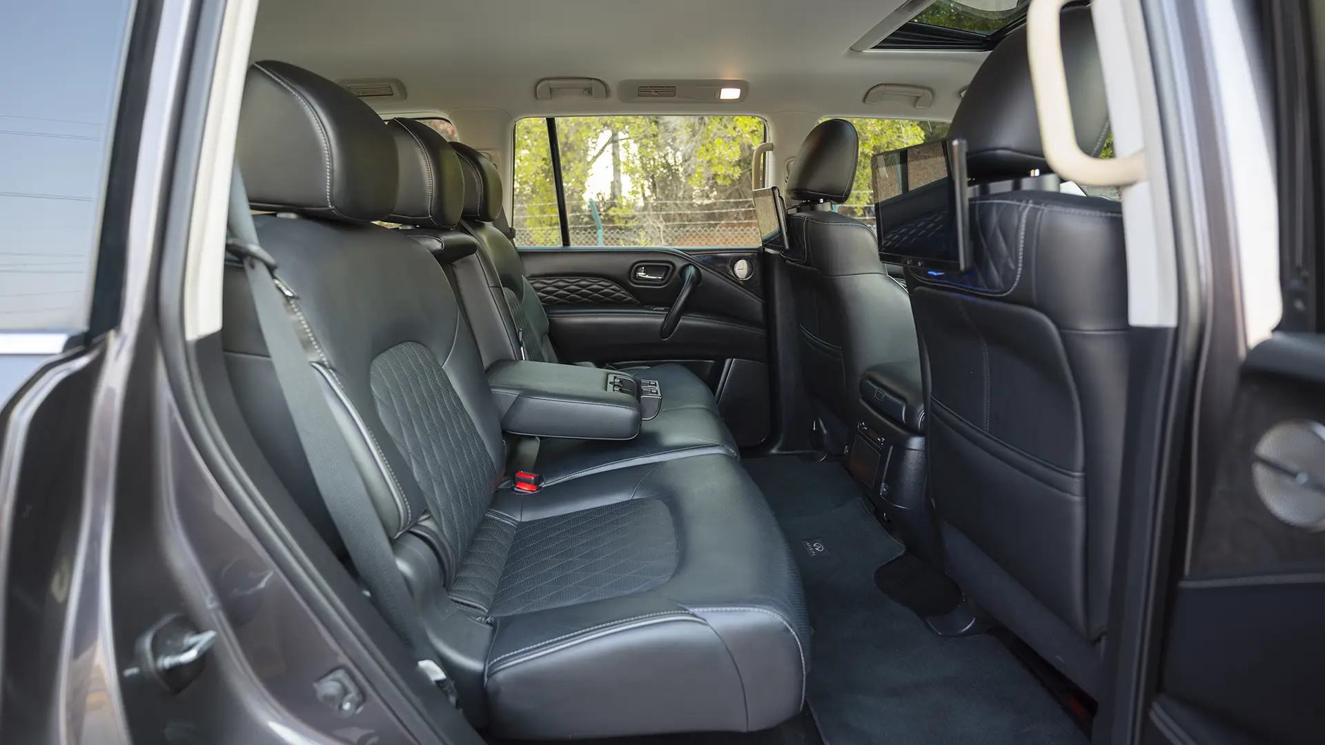 Used 2023 Infiniti QX80 Sensory in Grey – Rear Passenger Side Cabin View for Sale at First Choice Cars Dubai Sharjah