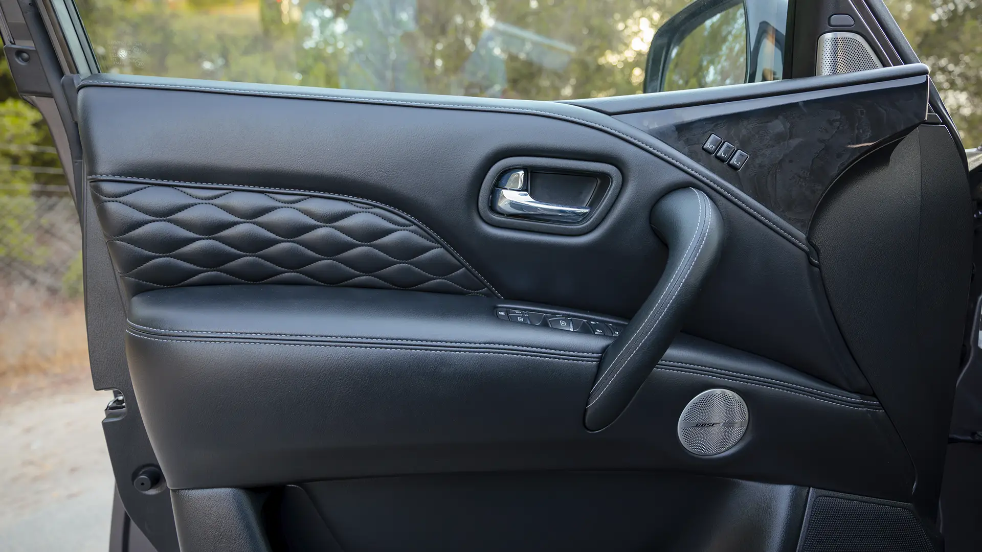 Used 2023 Infiniti QX80 Sensory in Grey – Driver Door Panel Full View for Sale at First Choice Cars Dubai Sharjah