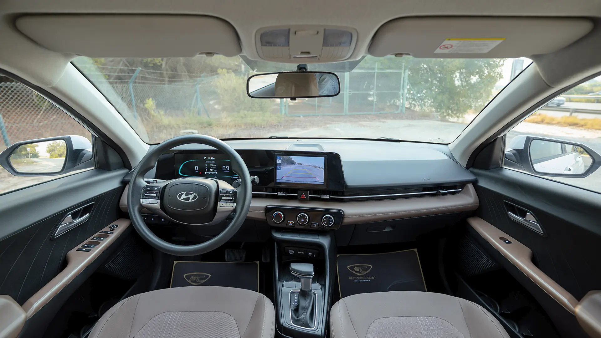 Used 2025 Hyundai Accent Smart in White – Front Cabin / Dashboard Full View for Sale at First Choice Cars Dubai Sharjah