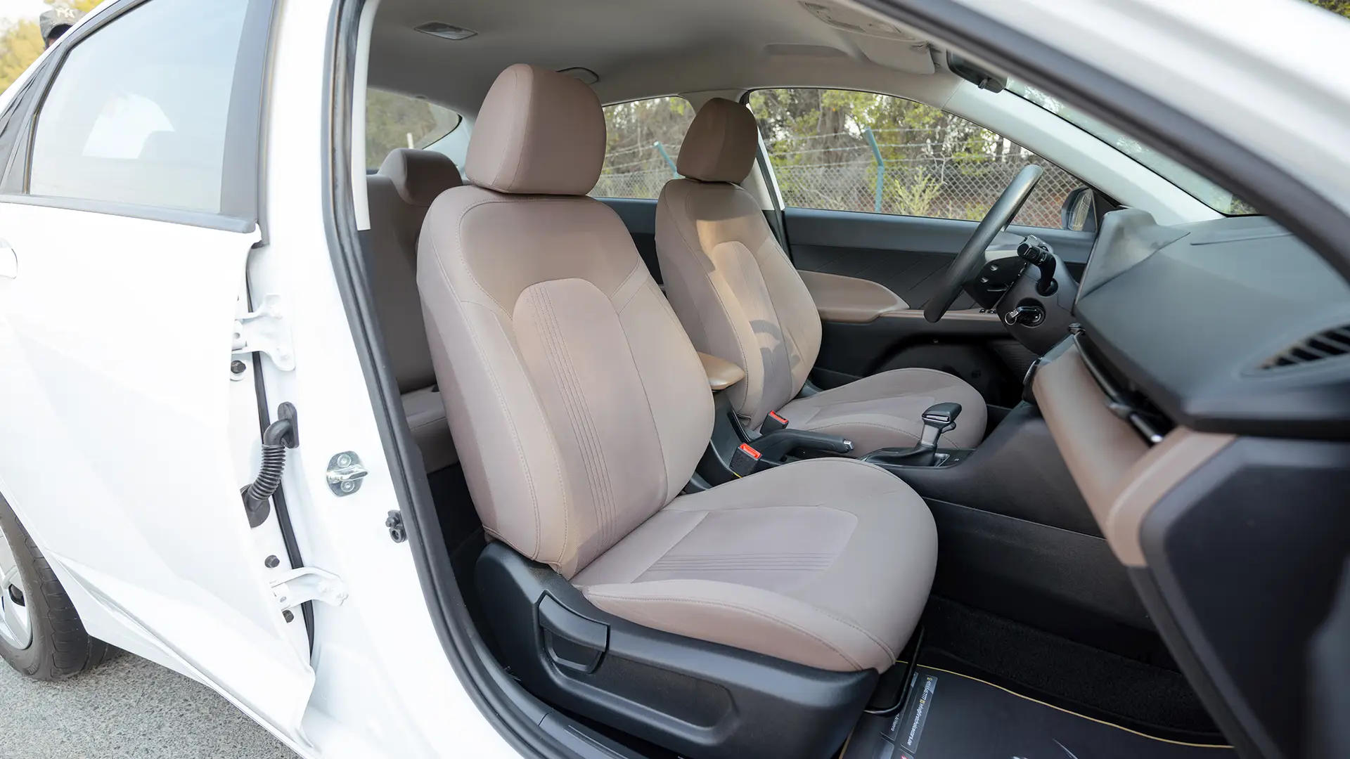 Used 2025 Hyundai Accent Smart in White – Front Passenger Side Cabin View for Sale at First Choice Cars Dubai Sharjah