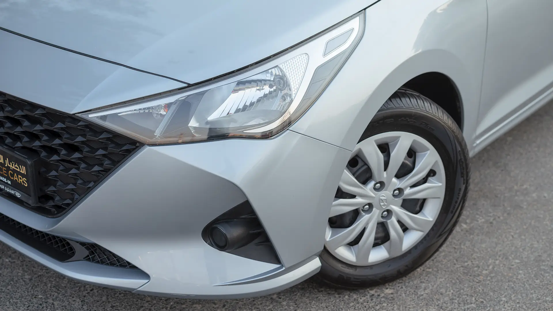 Used 2023 Hyundai Accent Smart in Silver – Headlight Close-up for Sale at First Choice Cars Dubai Sharjah