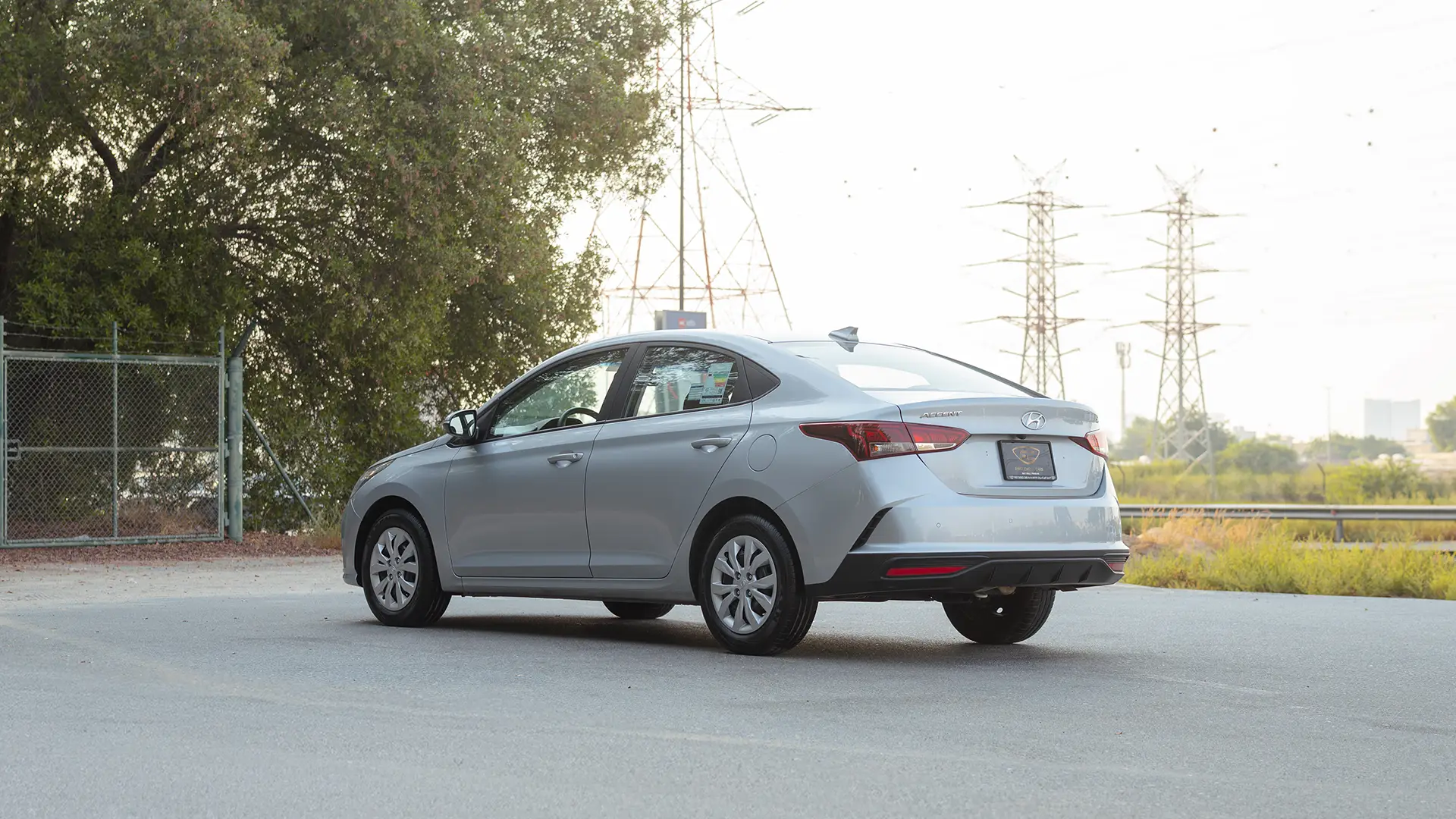 Used 2023 Hyundai Accent Smart in Silver – Left Back Diagonal (45°) View for Sale at First Choice Cars Dubai Sharjah