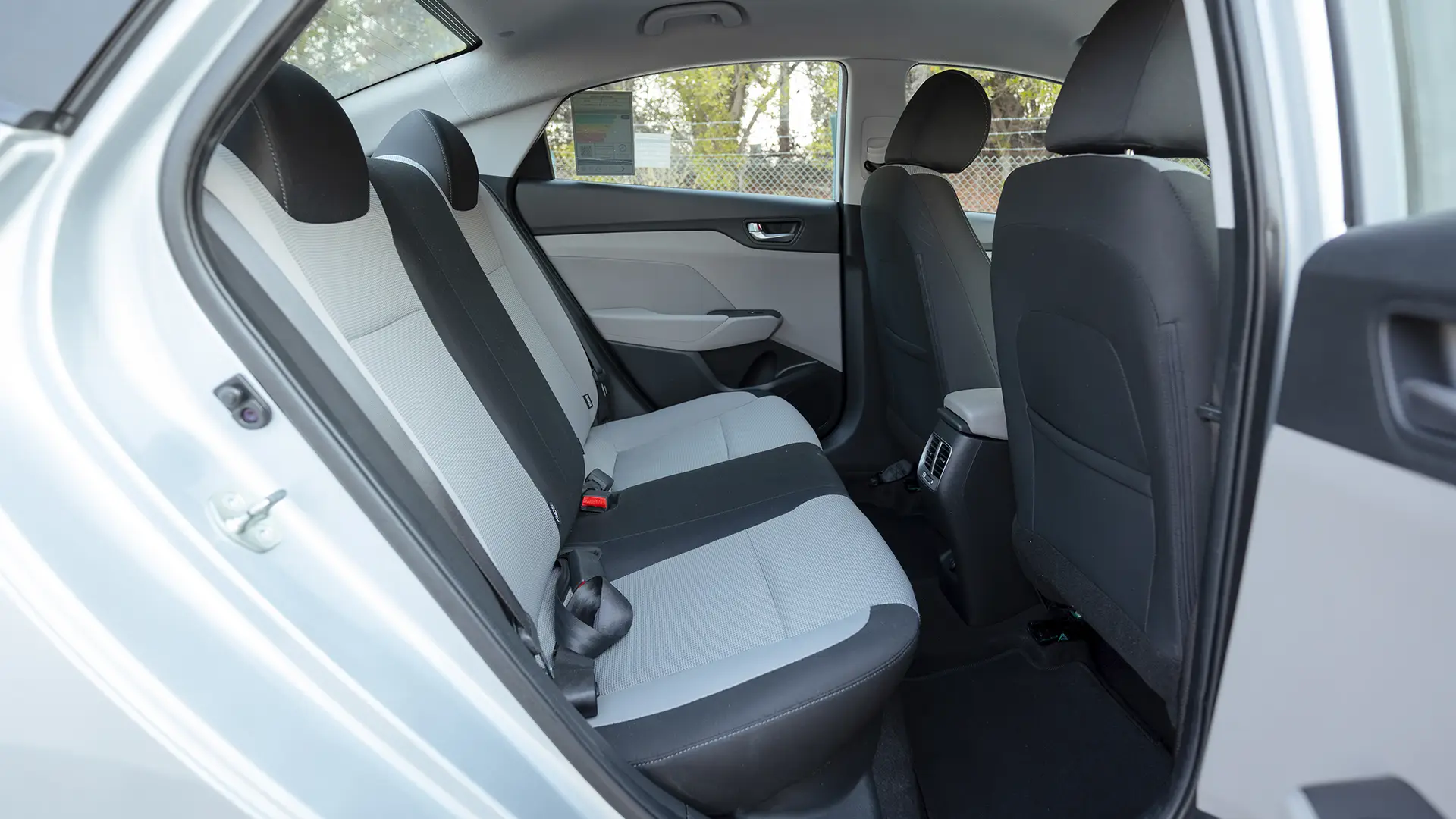 Used 2023 Hyundai Accent Smart in Silver – Rear Passenger Side Cabin View for Sale at First Choice Cars Dubai Sharjah