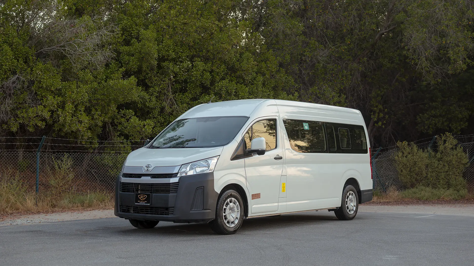Used 2022 Toyota Hiace GL High Roof in White – Left Front Diagonal (45°) View for Sale at First Choice Cars Dubai Sharjah
