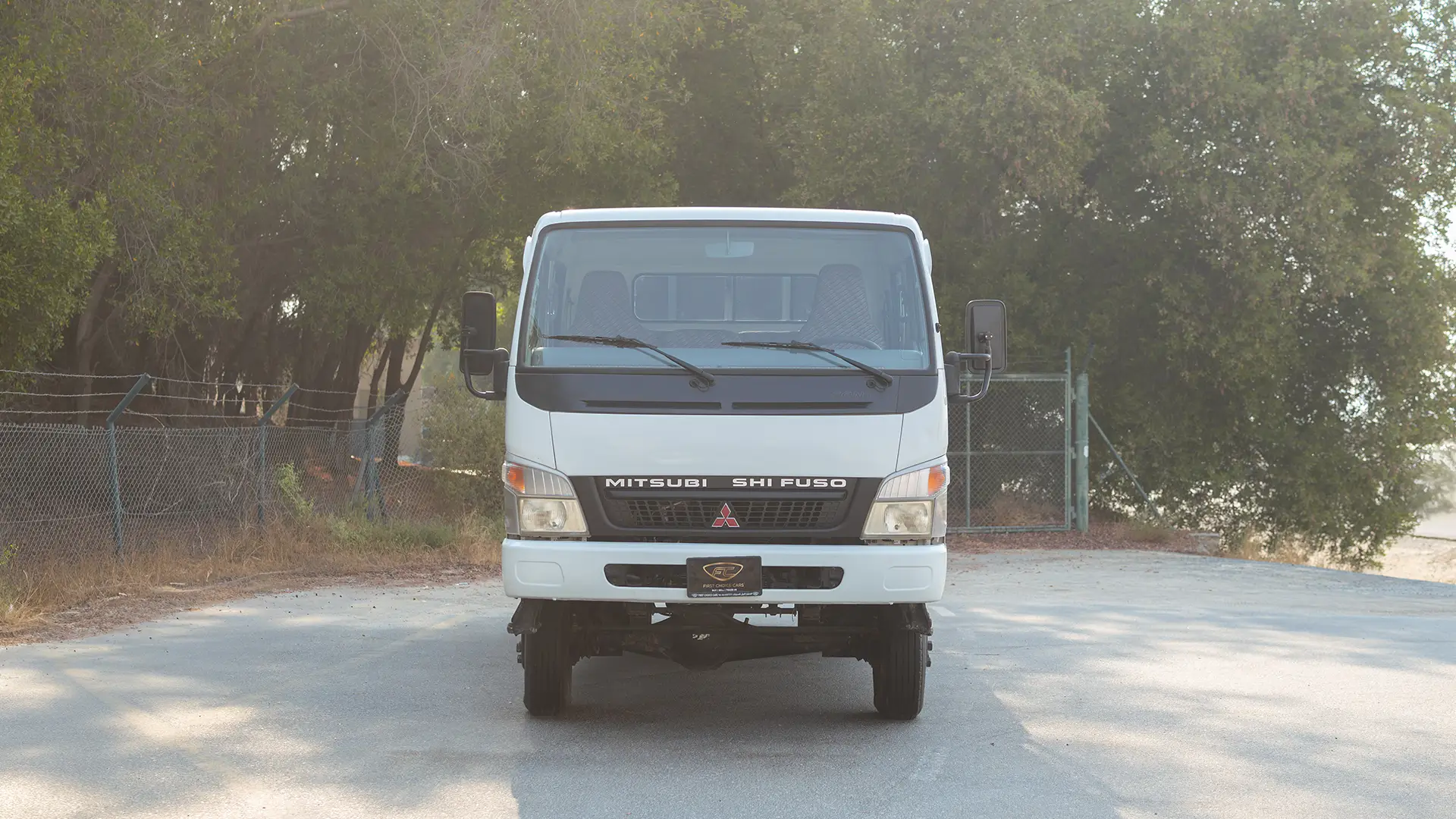 Used 2016 Mitsubishi Canter Double Cabin Cargo Body in White – Front View for Sale at First Choice Cars Dubai Sharjah