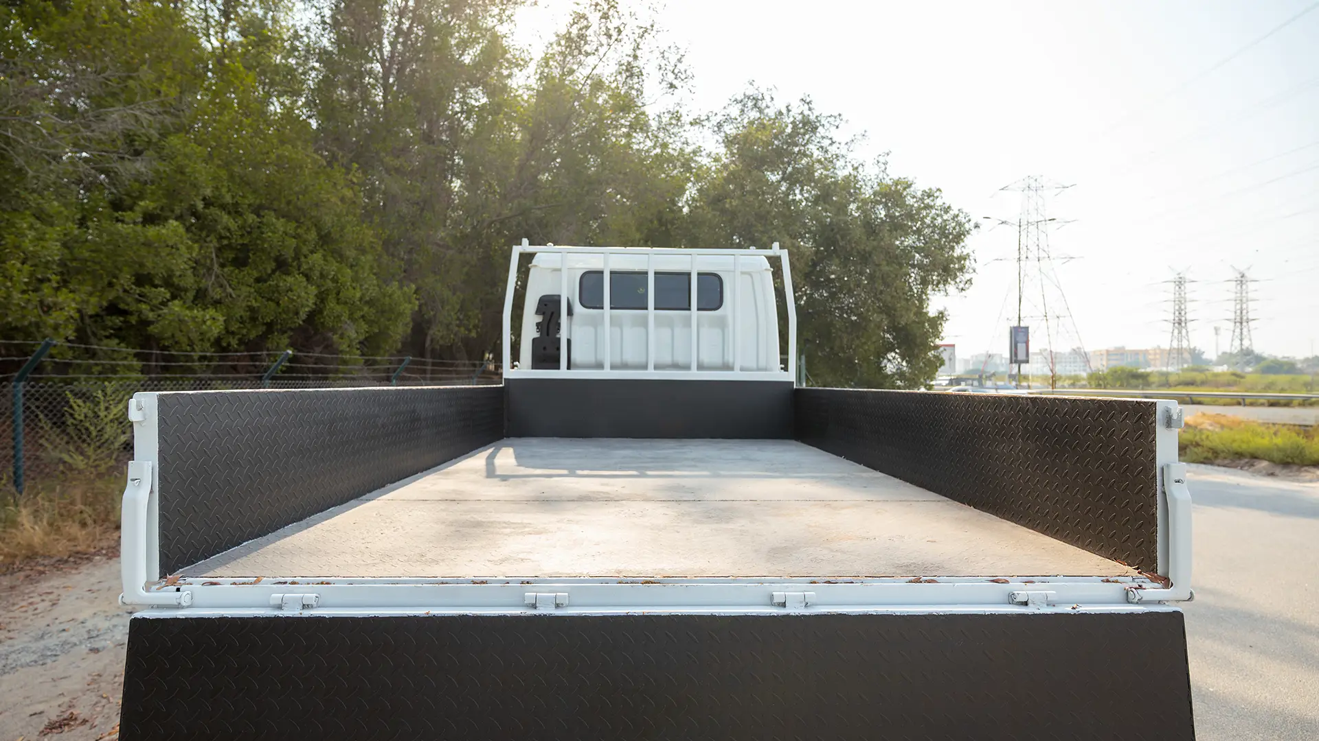 Used 2016 Mitsubishi Canter Double Cabin Cargo Body in White – Boot / Trunk Space Open View for Sale at First Choice Cars Dubai Sharjah