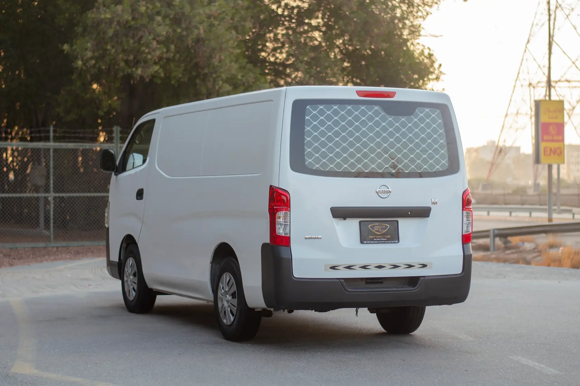 Used 2022 Nissan Urvan Standard Roof in White – Left Back Diagonal (45°) View for Sale at First Choice Cars Dubai Sharjah