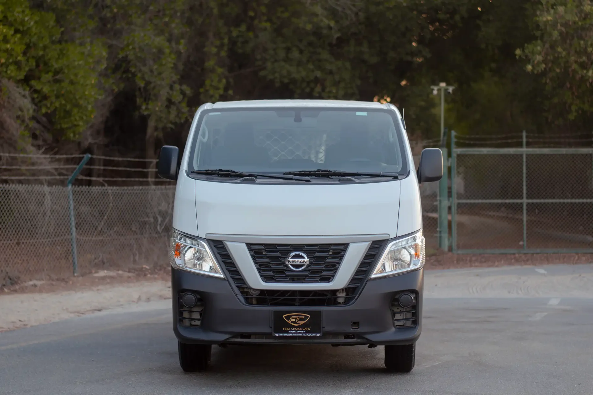 Used 2022 Nissan Urvan Standard Roof in White – Front View for Sale at First Choice Cars Dubai Sharjah