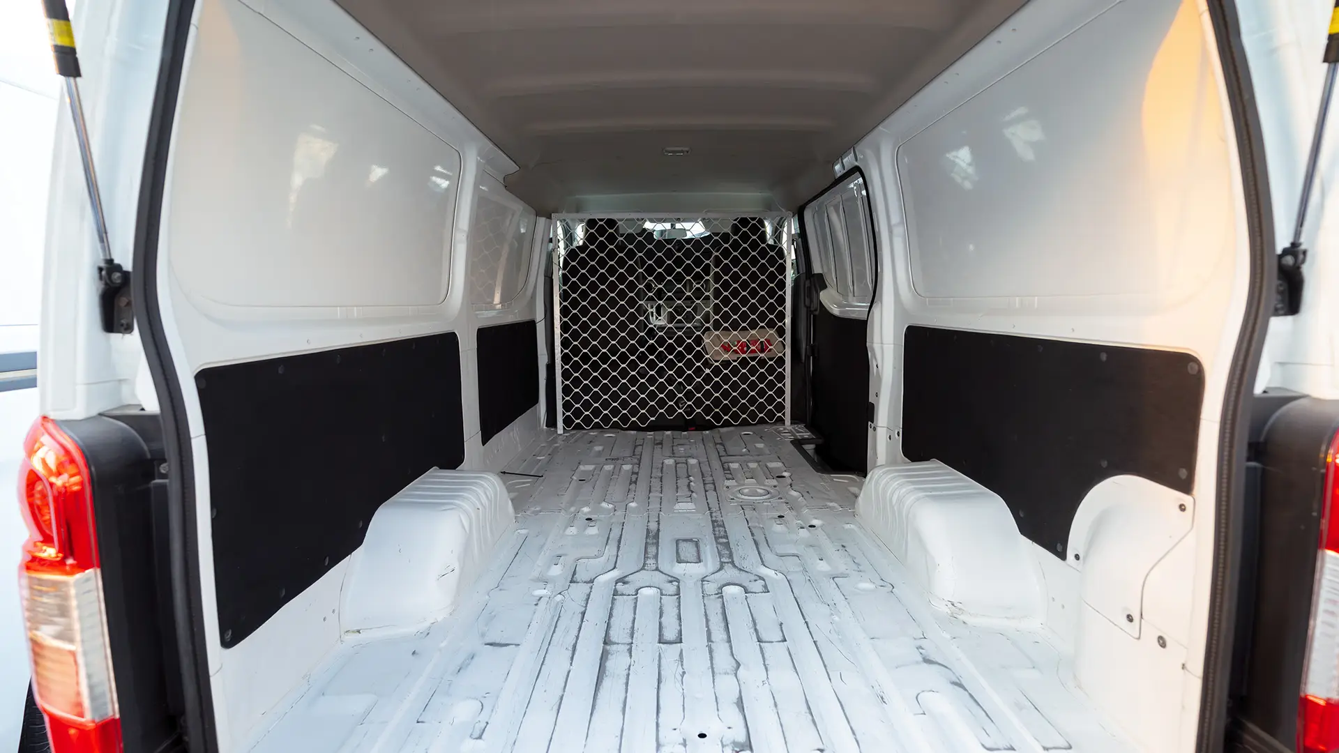 Used 2022 Nissan Urvan Standard Roof in White – Delivery Box Rear Opening View for Sale at First Choice Cars Dubai Sharjah