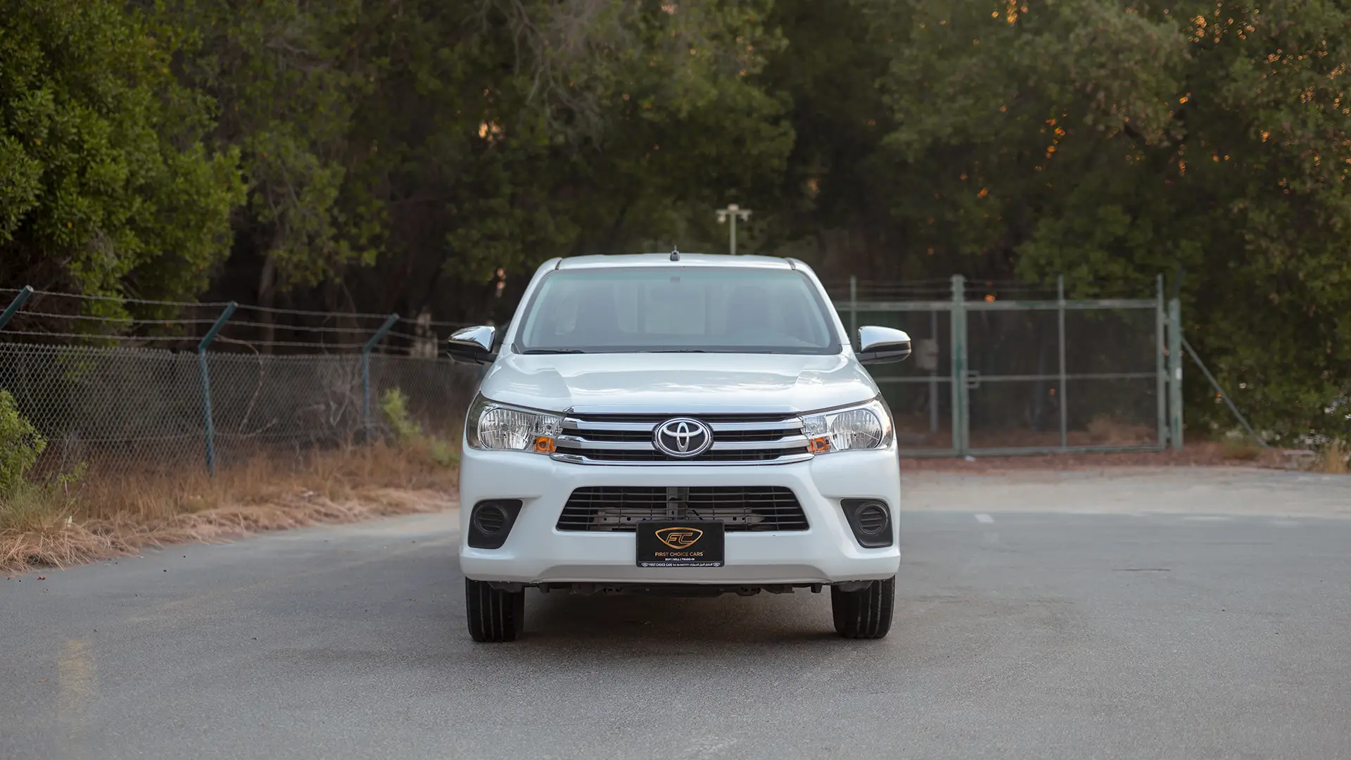 Used 2022 Toyota Hilux GLX Double Cabin in White – Front View for Sale at First Choice Cars Dubai Sharjah