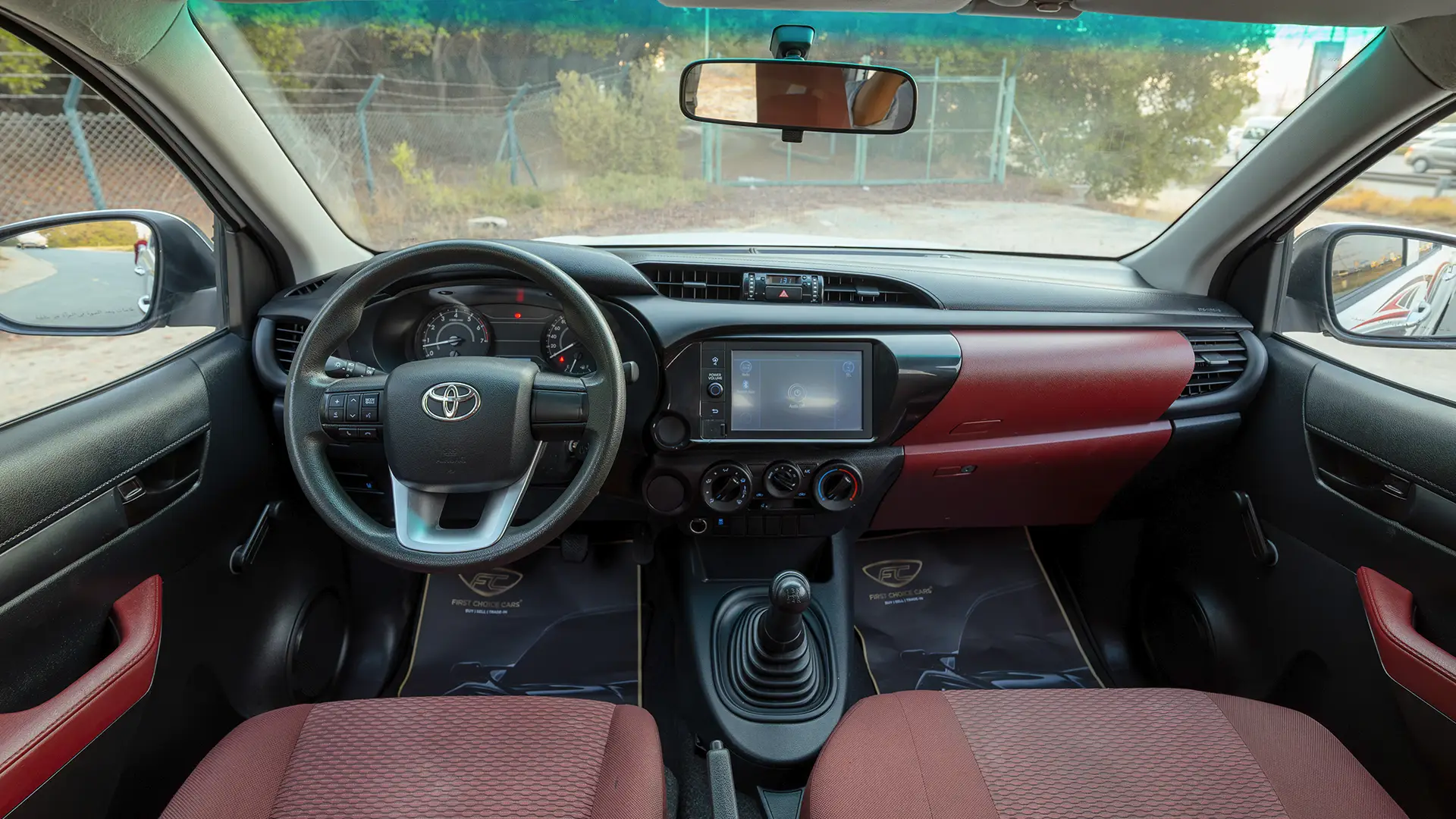 Used 2022 Toyota Hilux GLX Double Cabin in White – Front Cabin / Dashboard Full View for Sale at First Choice Cars Dubai Sharjah
