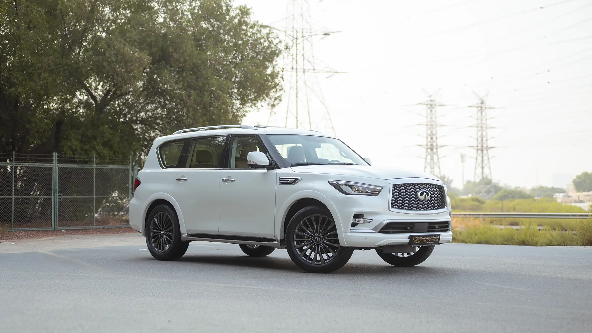 Used 2024 Infiniti QX80 Sensory in White – Right Front Diagonal (45°) View for Sale at First Choice Cars Dubai Sharjah