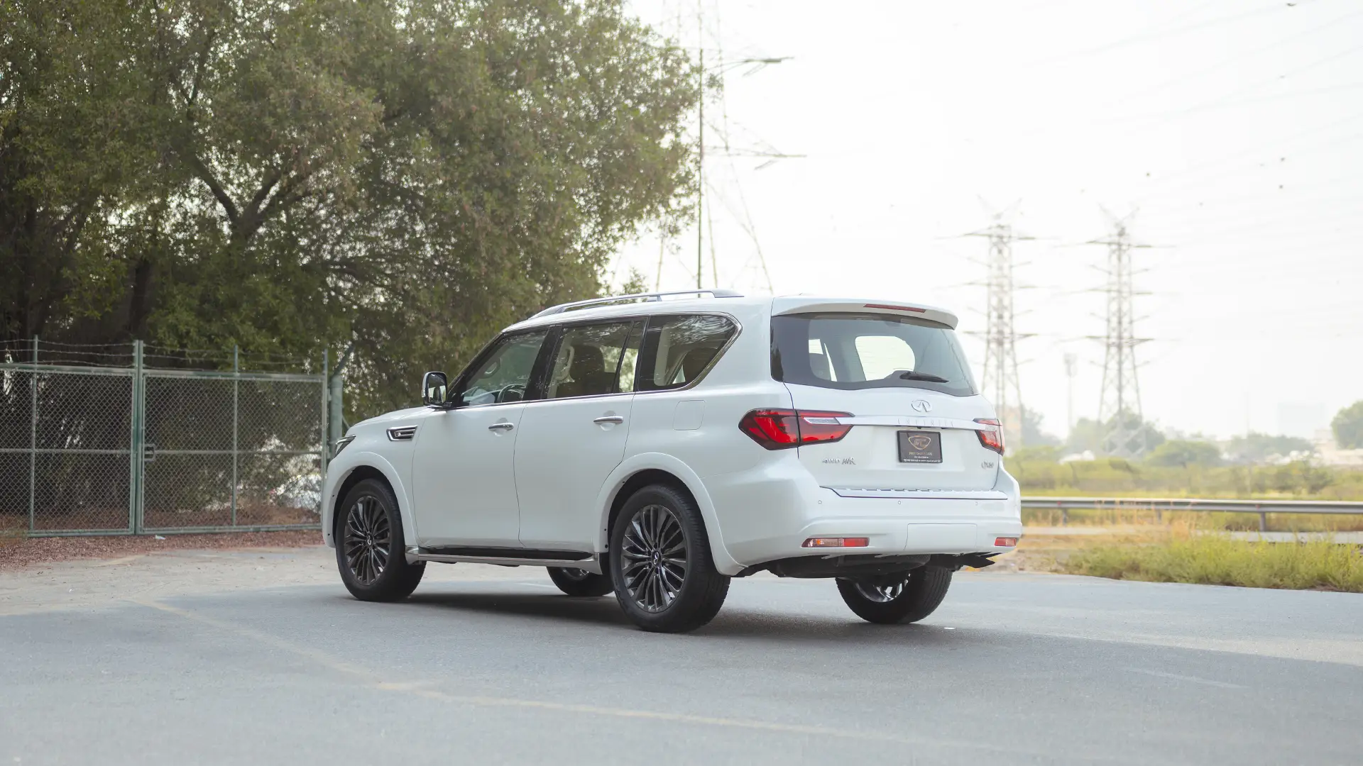 Used 2024 Infiniti QX80 Sensory in White – Left Back Diagonal (45°) View for Sale at First Choice Cars Dubai Sharjah