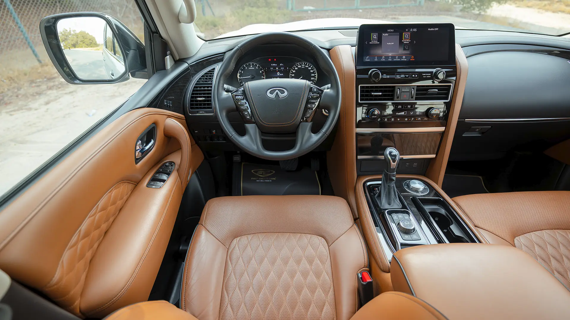 Used 2024 Infiniti QX80 Sensory in White – Steering Wheel & Instrument Cluster for Sale at First Choice Cars Dubai Sharjah