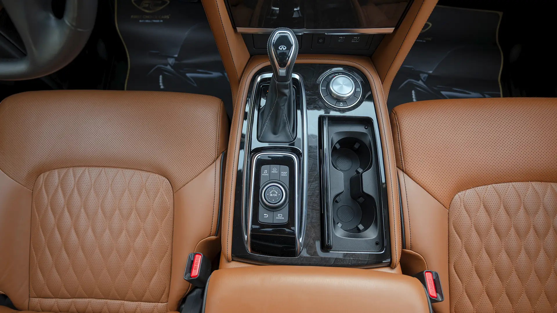 Used 2024 Infiniti QX80 Sensory in White – Center Console & Gear Shifter for Sale at First Choice Cars Dubai Sharjah