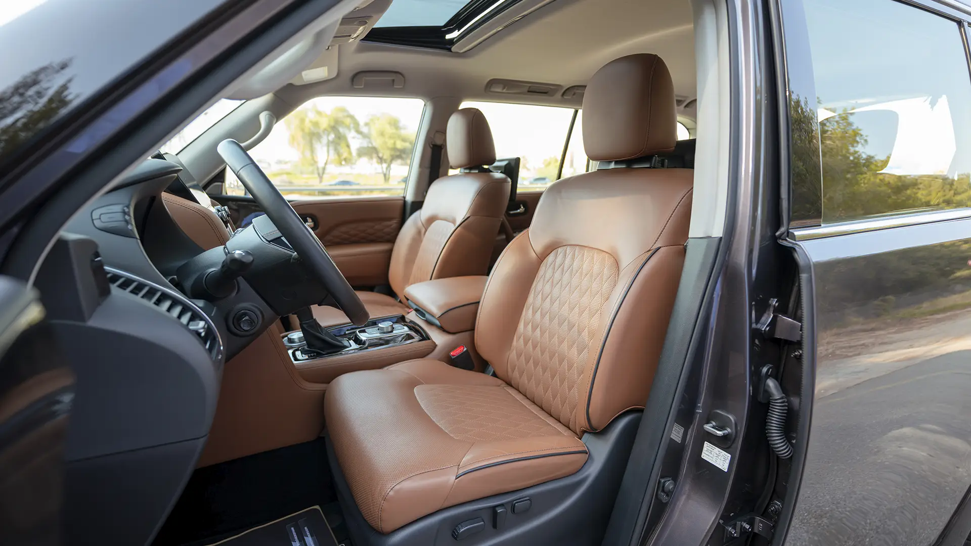 Used 2024 Infiniti QX80 Sensory in Grey – Front Driver Side Cabin View for Sale at First Choice Cars Dubai Sharjah