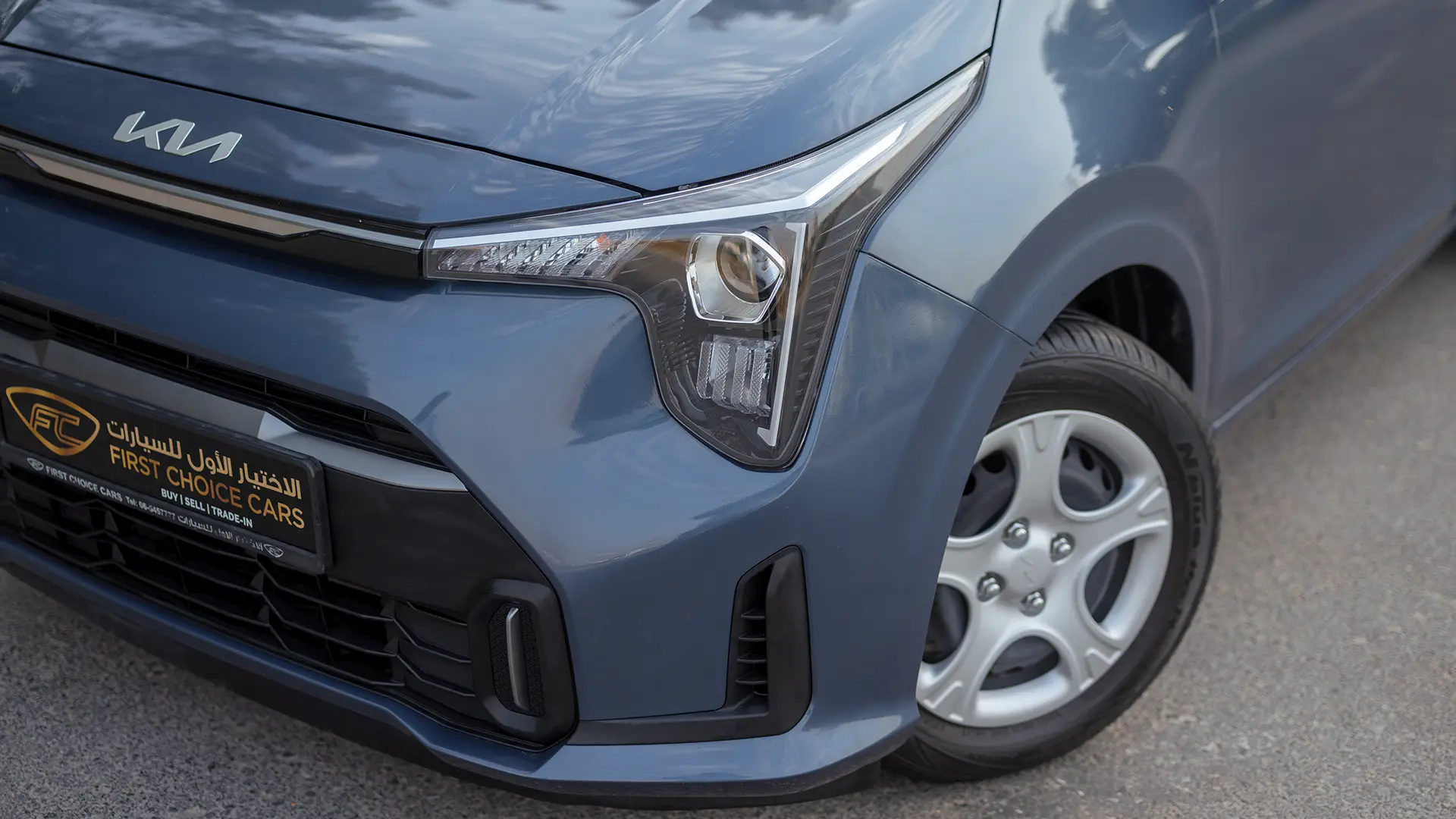 Used 2024 Kia Picanto LX in Blue – Headlight Close-up for Sale at First Choice Cars Dubai Sharjah