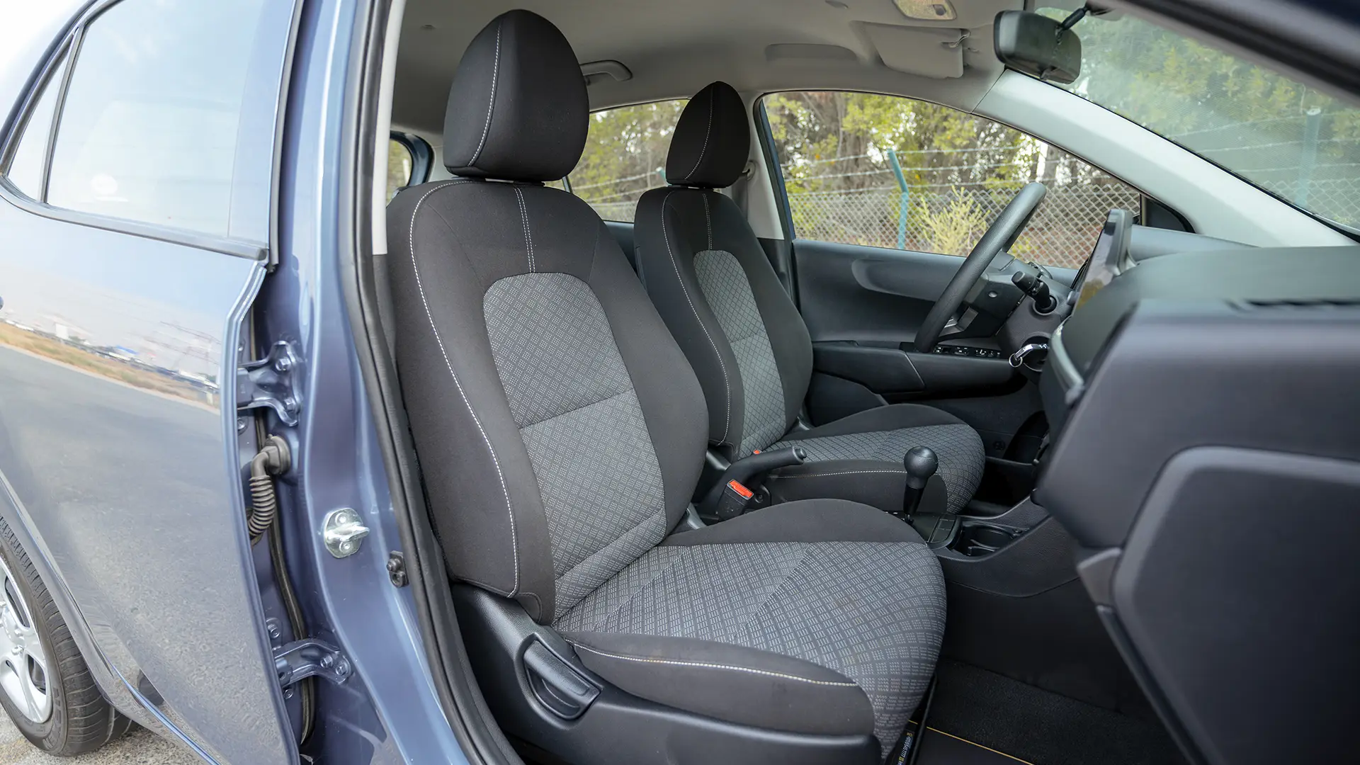 Used 2024 Kia Picanto LX in Blue – Front Passenger Side Cabin View for Sale at First Choice Cars Dubai Sharjah