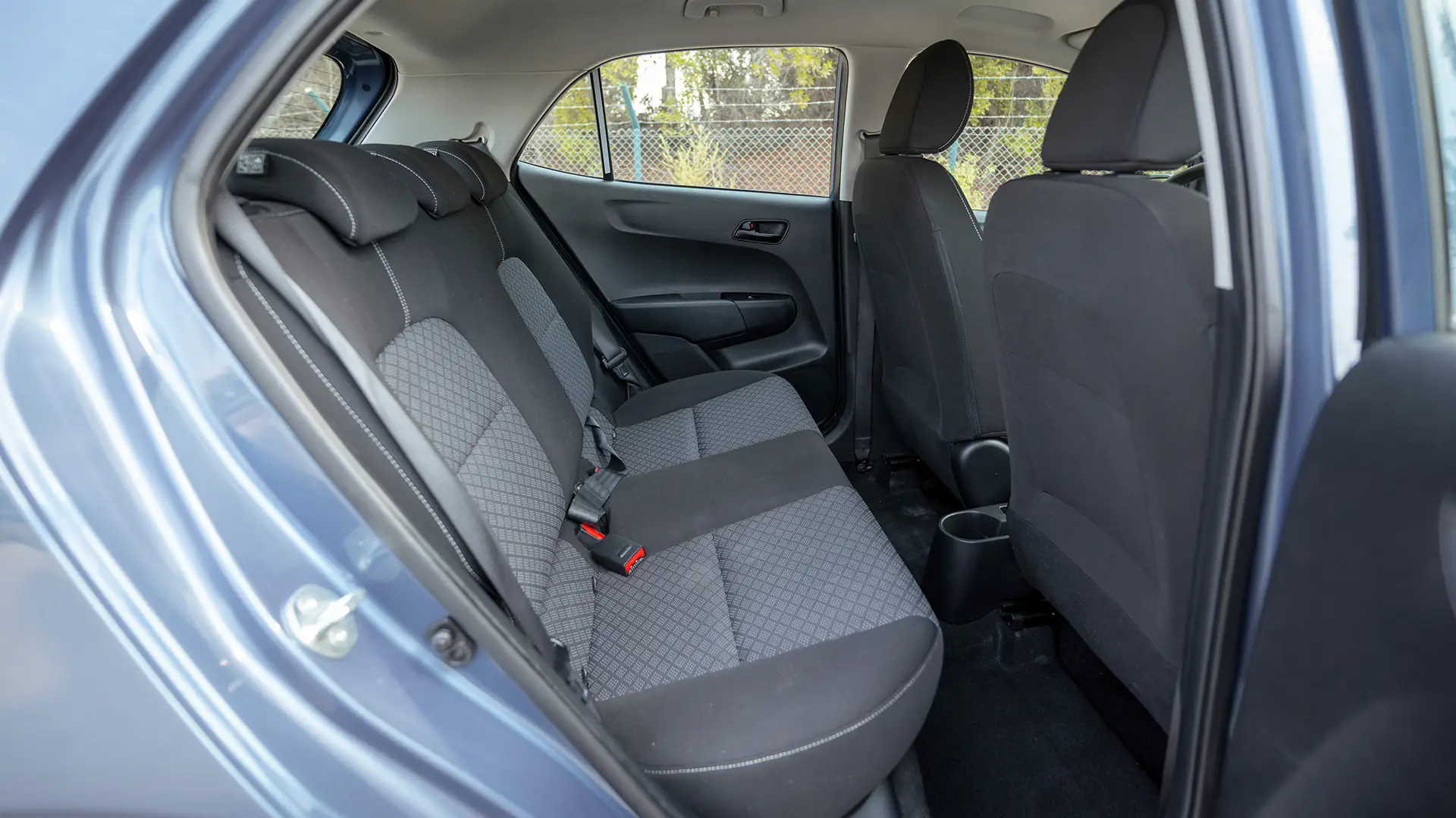 Used 2024 Kia Picanto LX in Blue – Rear Passenger Side Cabin View for Sale at First Choice Cars Dubai Sharjah