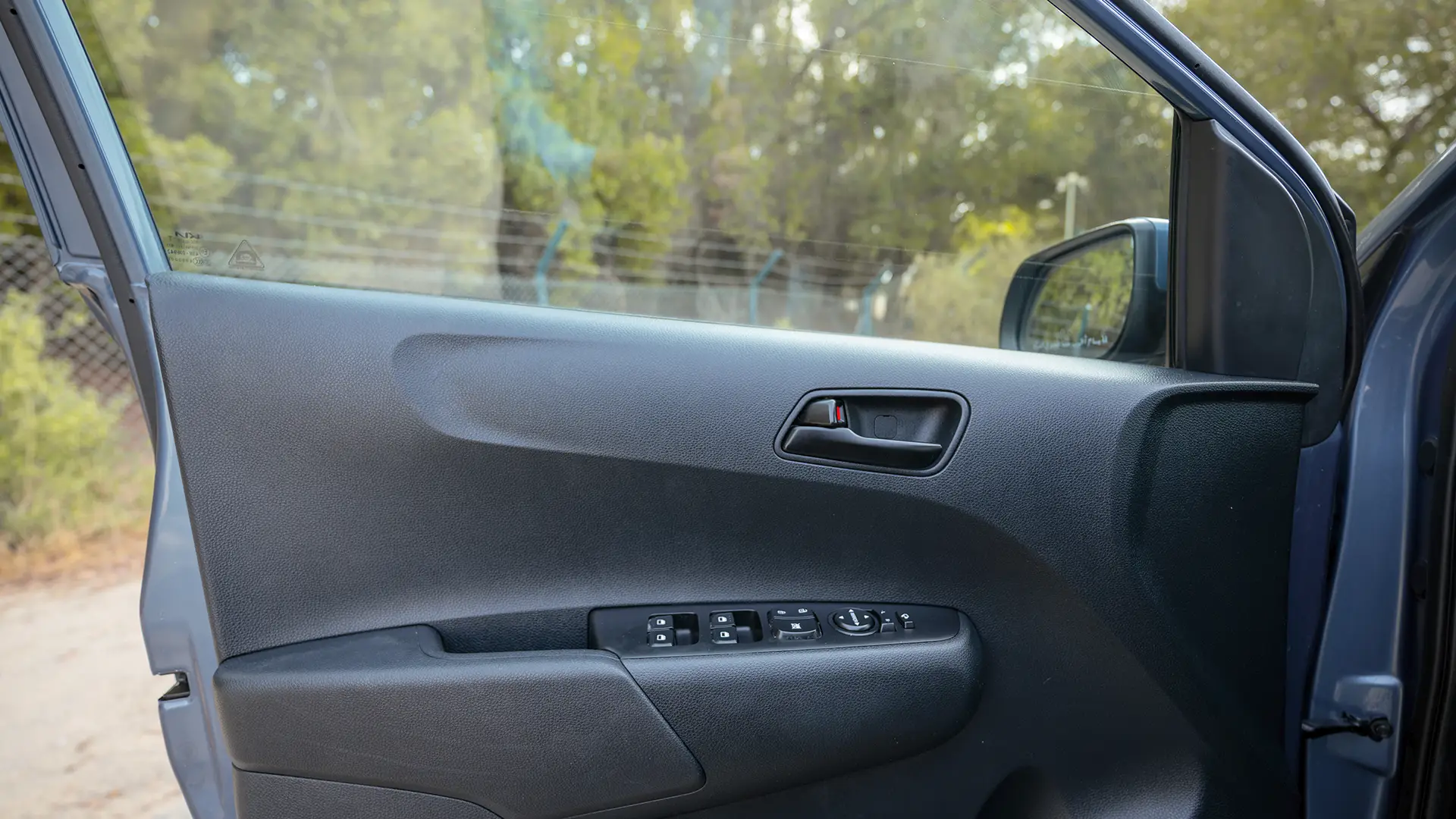 Used 2024 Kia Picanto LX in Blue – Driver Door Panel Full View for Sale at First Choice Cars Dubai Sharjah
