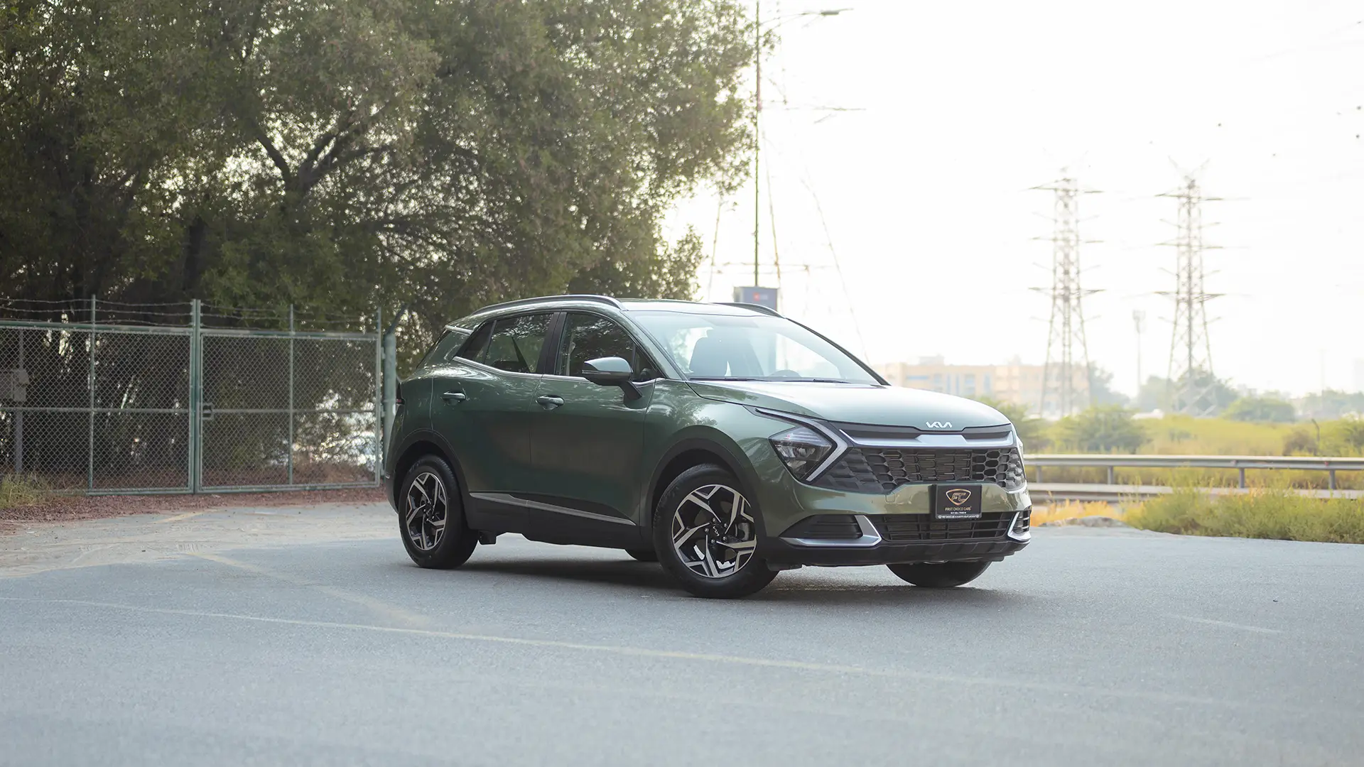 Used 2025 Kia Sportage LX in Green – Right Front Diagonal (45°) View for Sale at First Choice Cars Dubai Sharjah