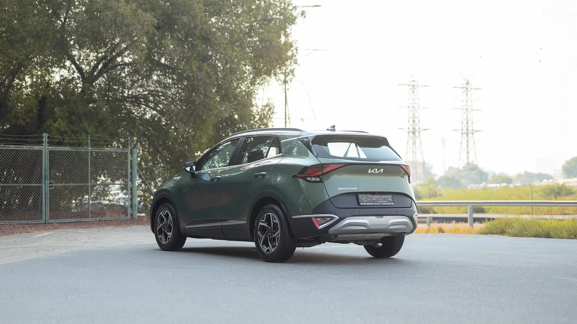 Used 2025 Kia Sportage LX in Green – Left Back Diagonal (45°) View for Sale at First Choice Cars Dubai Sharjah