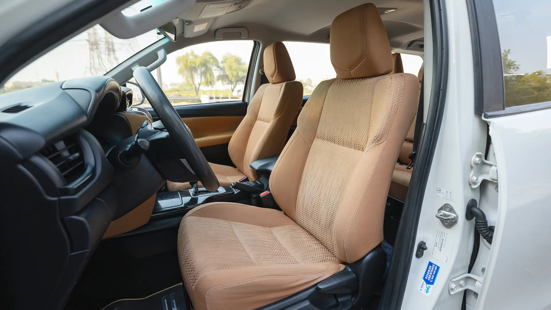 Used 2021 Toyota Fortuner EXR in White – Front Driver Side Cabin View for Sale at First Choice Cars Dubai Sharjah