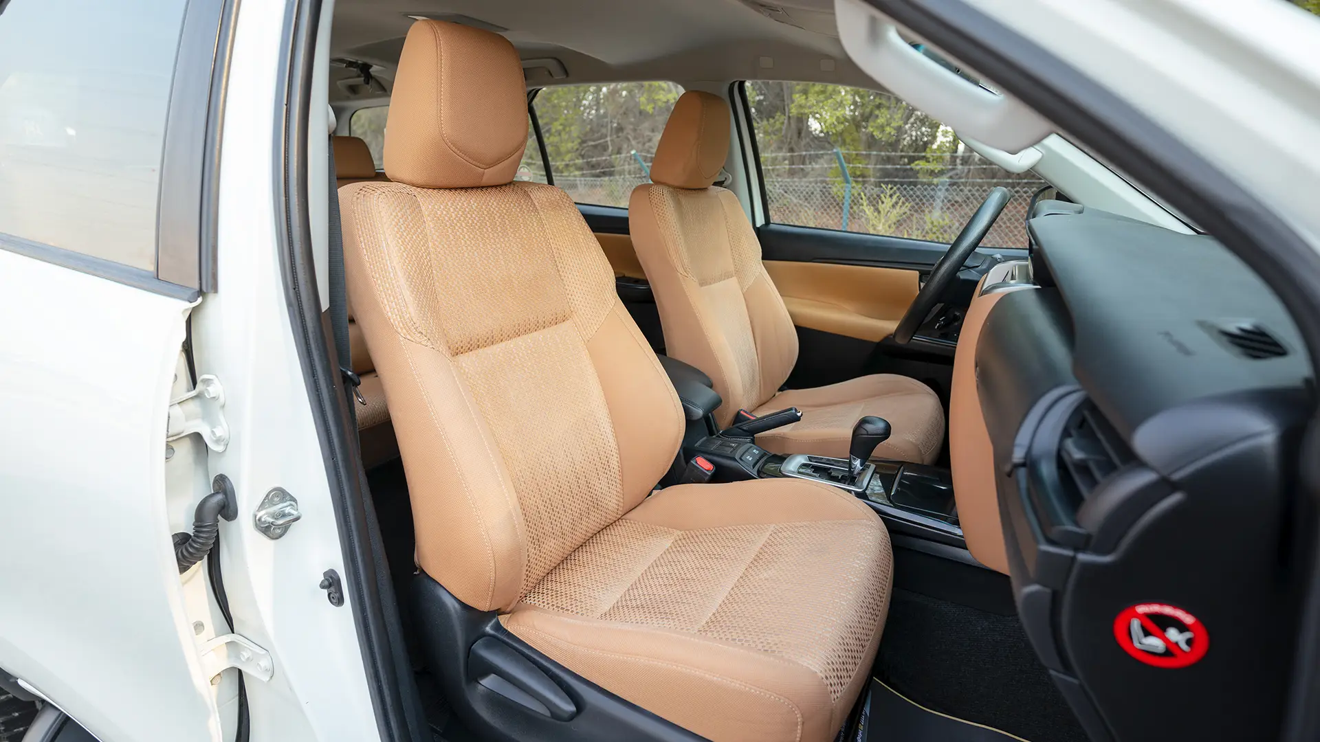 Used 2021 Toyota Fortuner EXR in White – Front Passenger Side Cabin View for Sale at First Choice Cars Dubai Sharjah