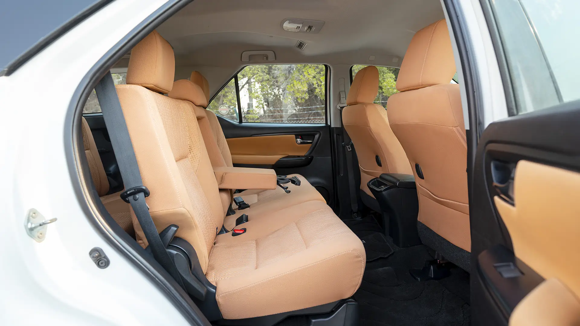 Used 2021 Toyota Fortuner EXR in White – Rear Passenger Side Cabin View for Sale at First Choice Cars Dubai Sharjah