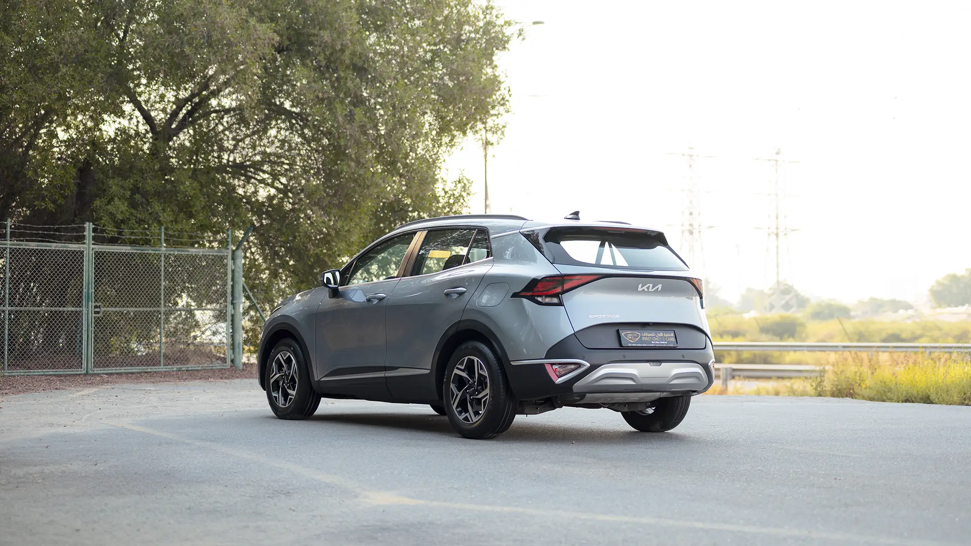 Used 2025 Kia Sportage LX in Silver – Left Back Diagonal (45°) View for Sale at First Choice Cars Dubai Sharjah