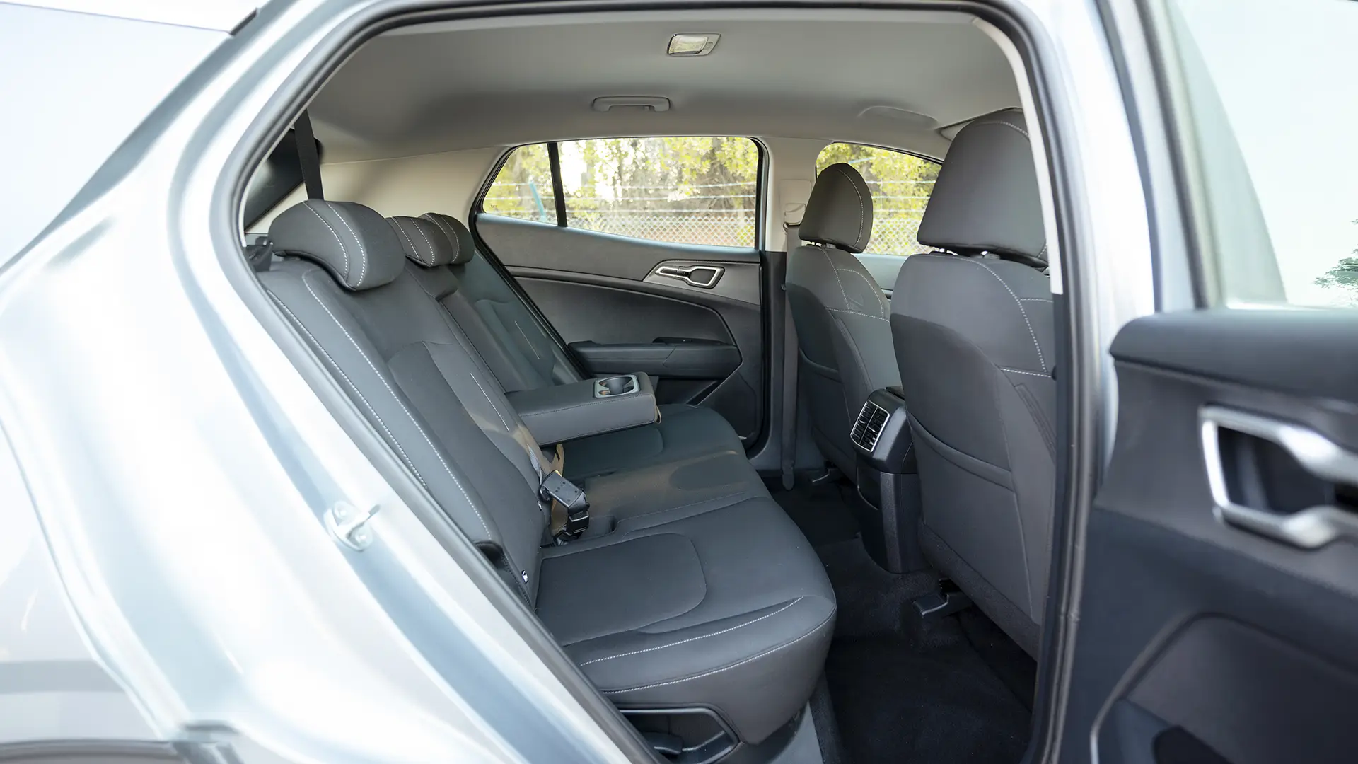Used 2025 Kia Sportage LX in Silver – Rear Passenger Side Cabin View for Sale at First Choice Cars Dubai Sharjah