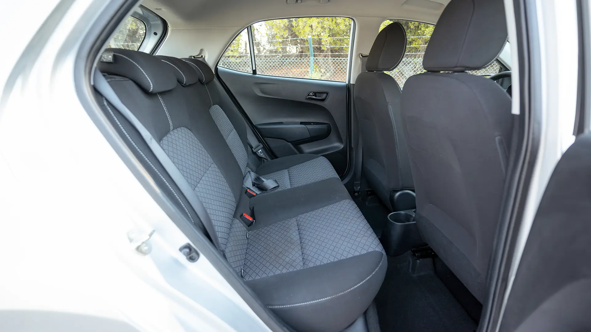 Used 2024 Kia Picanto LX in Silver – Rear Passenger Side Cabin View for Sale at First Choice Cars Dubai Sharjah