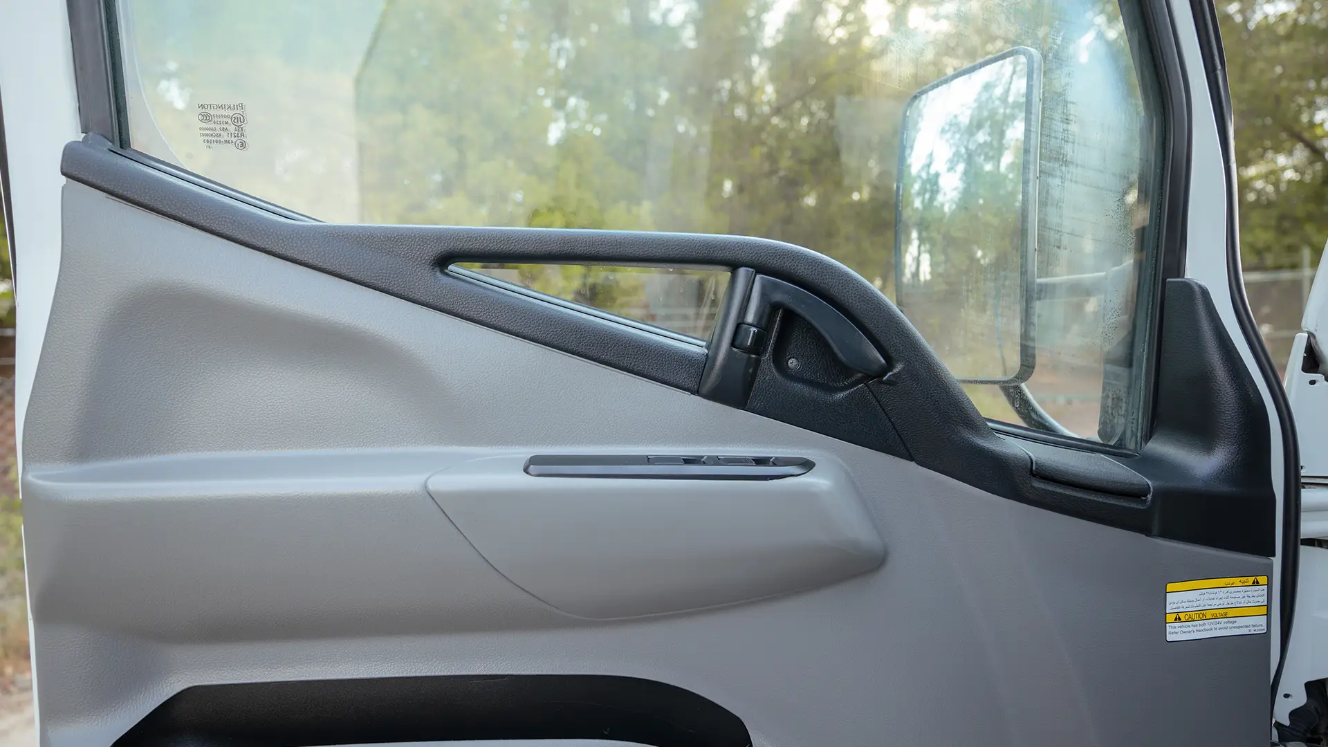 Used 2022 Mitsubishi Canter Chiller Box in White – Driver Door Panel Full View for Sale at First Choice Cars Dubai Sharjah