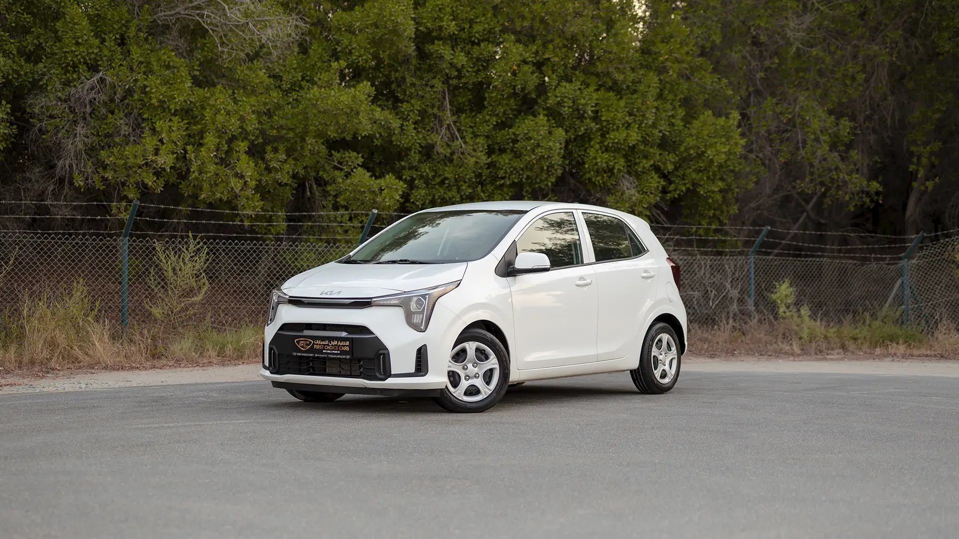Used 2024 Kia Picanto LX in White – Left Front Diagonal (45°) View for Sale at First Choice Cars Dubai Sharjah