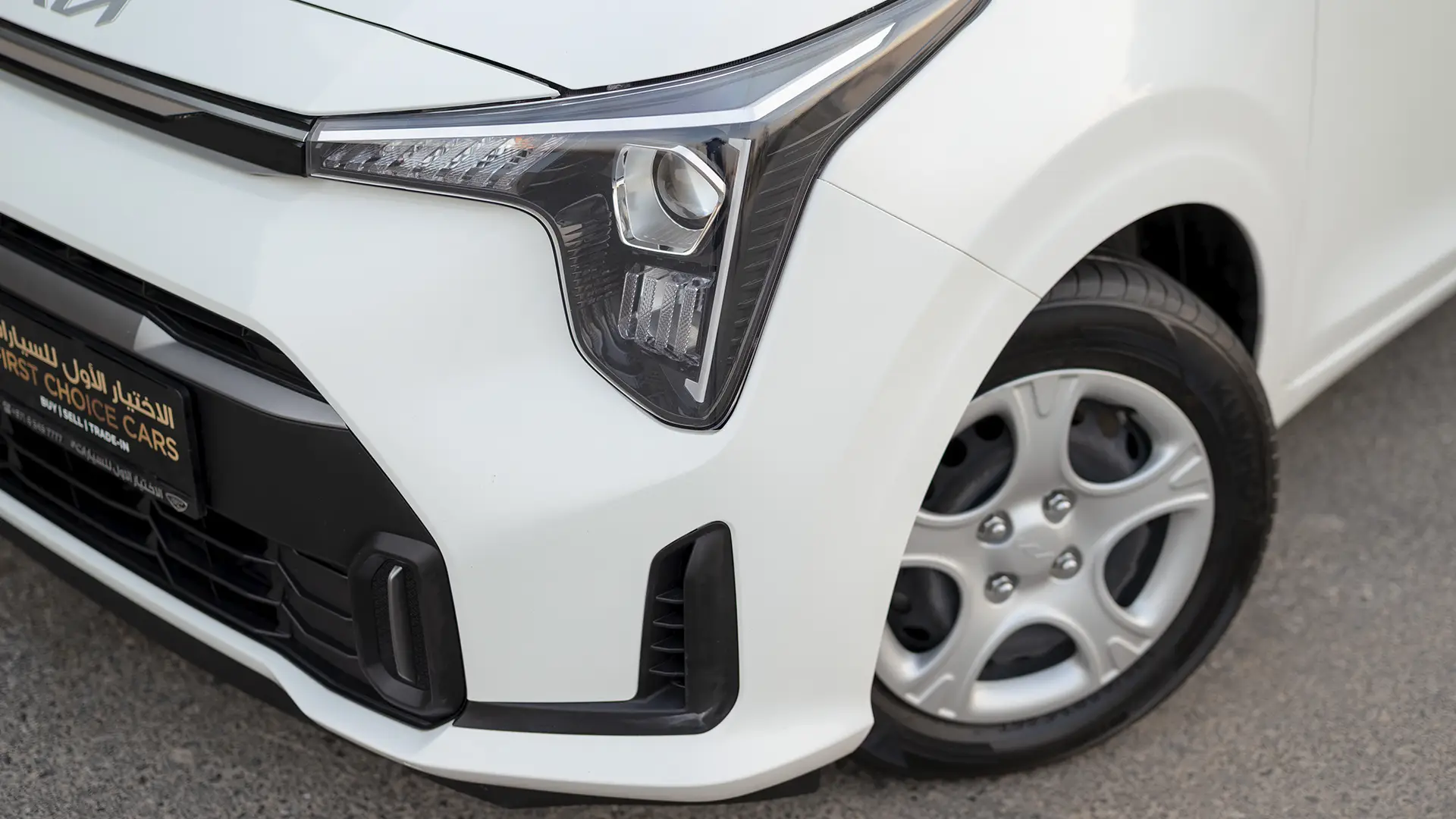 Used 2024 Kia Picanto LX in White – Headlight Close-up for Sale at First Choice Cars Dubai Sharjah