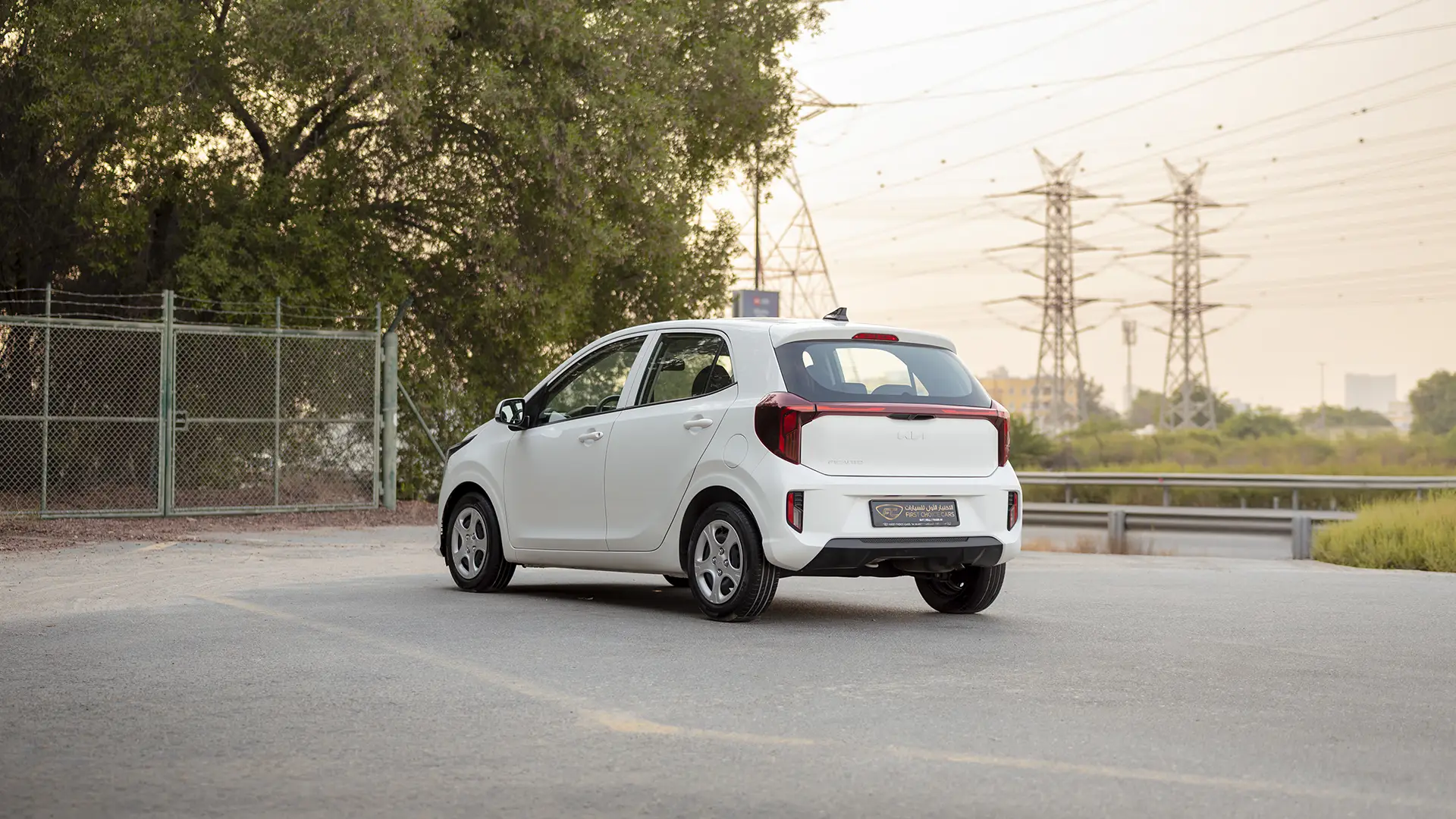 Used 2024 Kia Picanto LX in White – Left Back Diagonal (45°) View for Sale at First Choice Cars Dubai Sharjah