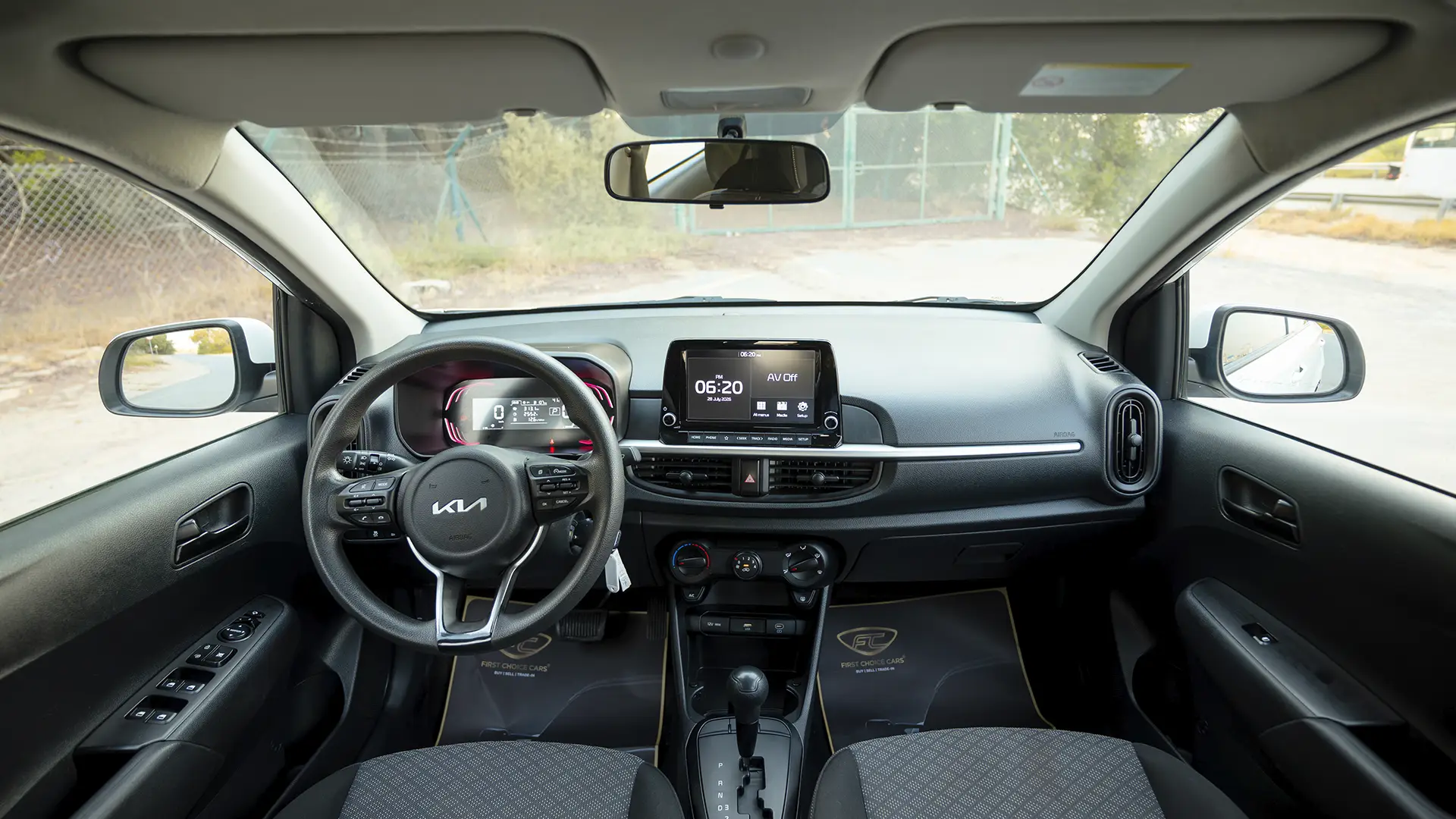 Used 2024 Kia Picanto LX in White – Front Cabin / Dashboard Full View for Sale at First Choice Cars Dubai Sharjah