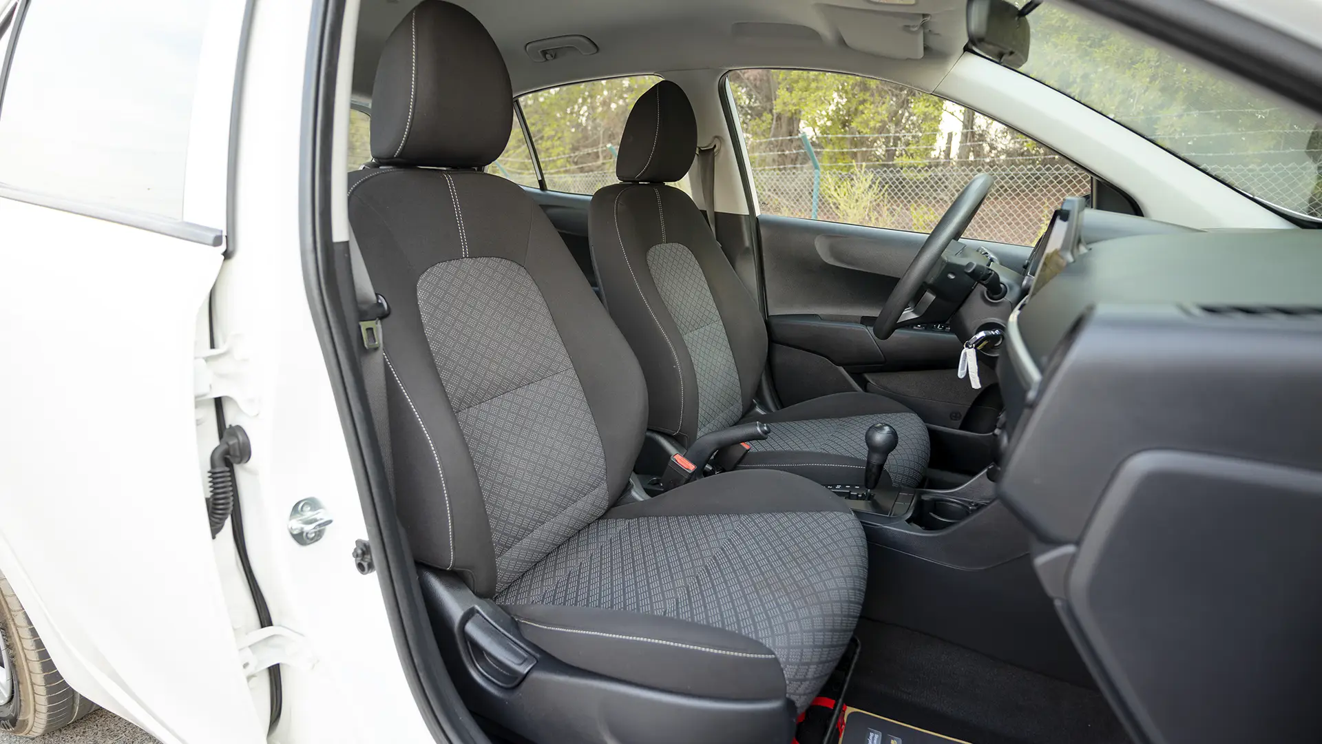 Used 2024 Kia Picanto LX in White – Front Passenger Side Cabin View for Sale at First Choice Cars Dubai Sharjah