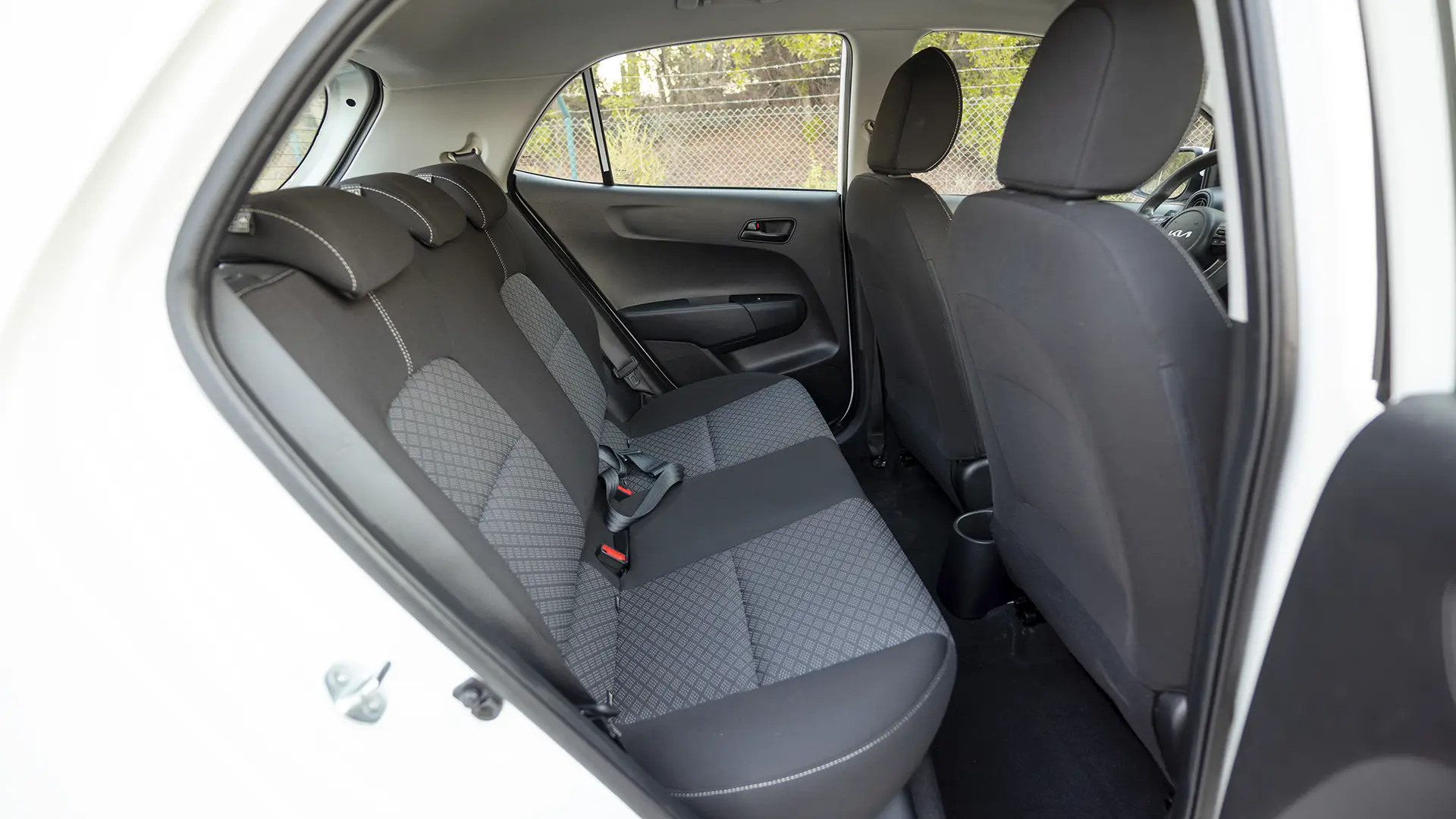 Used 2024 Kia Picanto LX in White – Rear Passenger Side Cabin View for Sale at First Choice Cars Dubai Sharjah