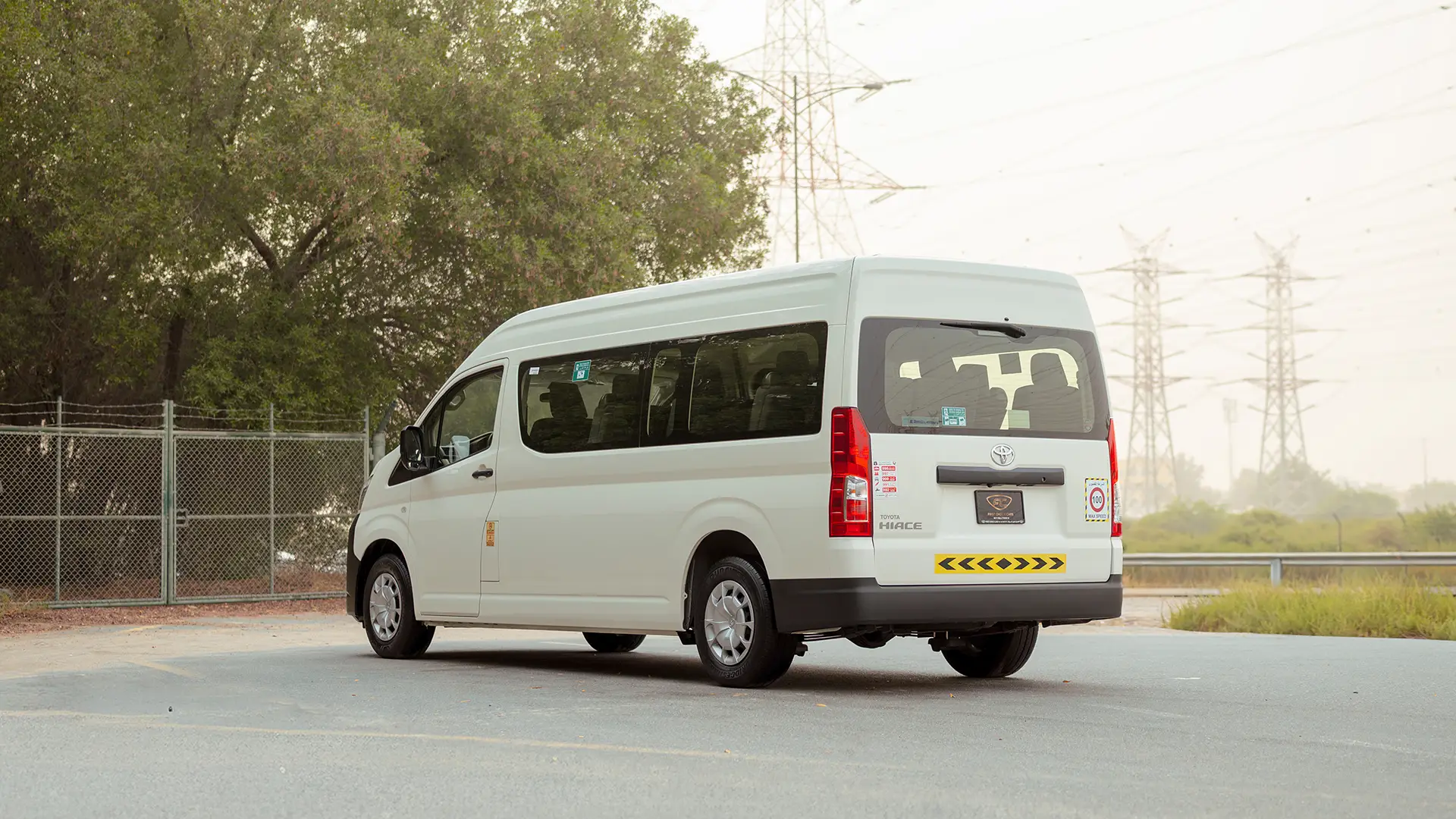 Used 2026 Toyota Hiace GL High Roof in White – Left Back Diagonal (45°) View for Sale at First Choice Cars Dubai Sharjah